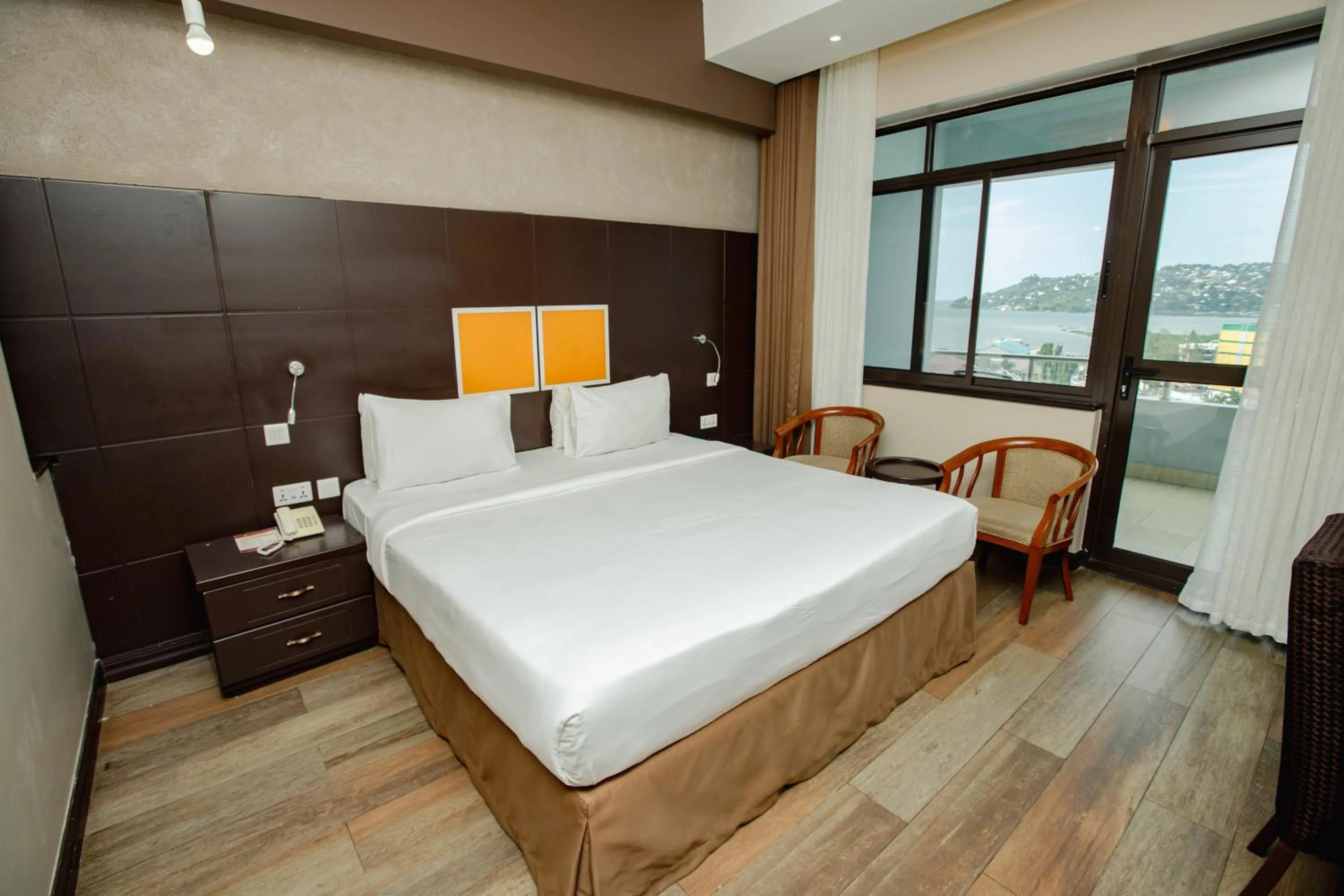 Bed in Gold Crest Hotel