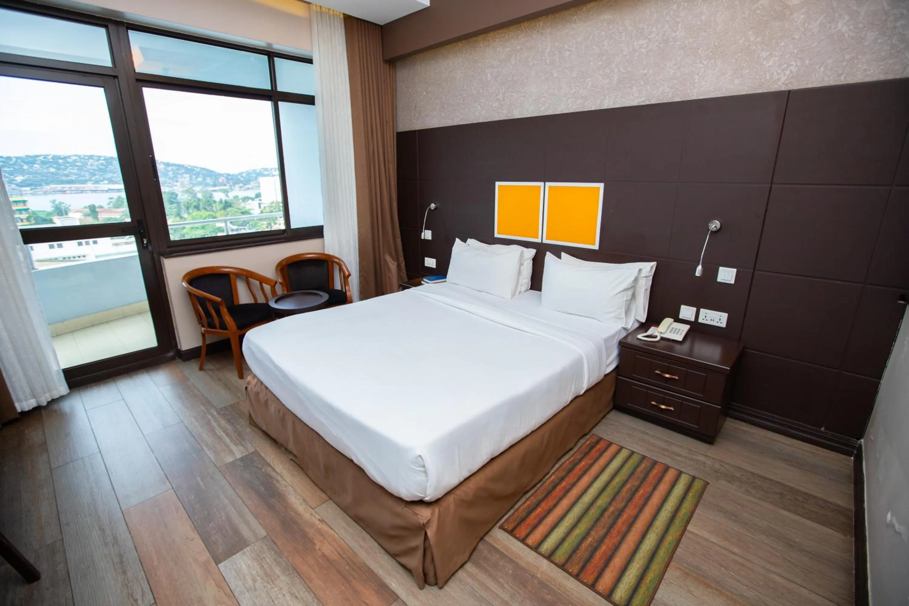 Bed in Gold Crest Hotel