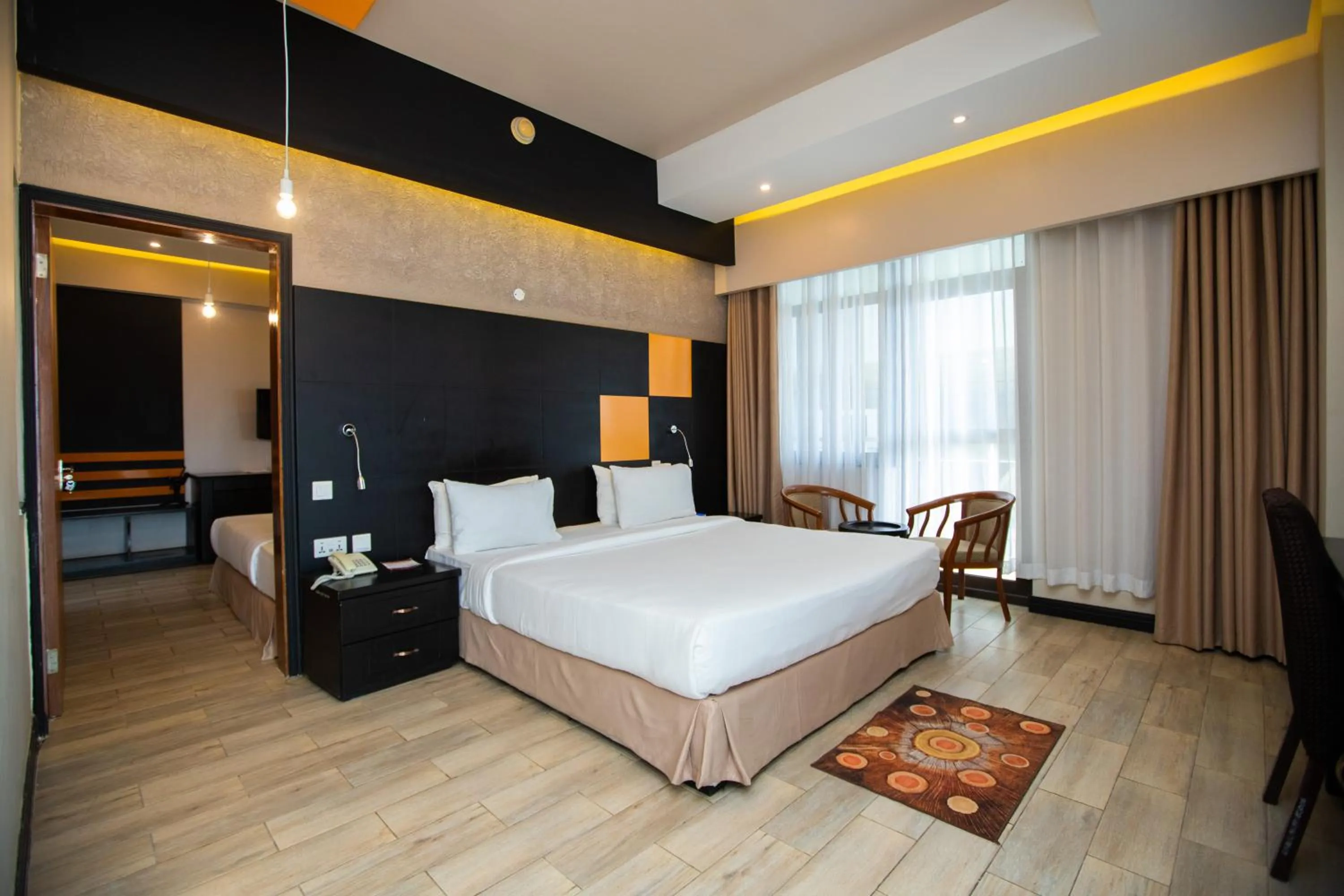 Bed in Gold Crest Hotel