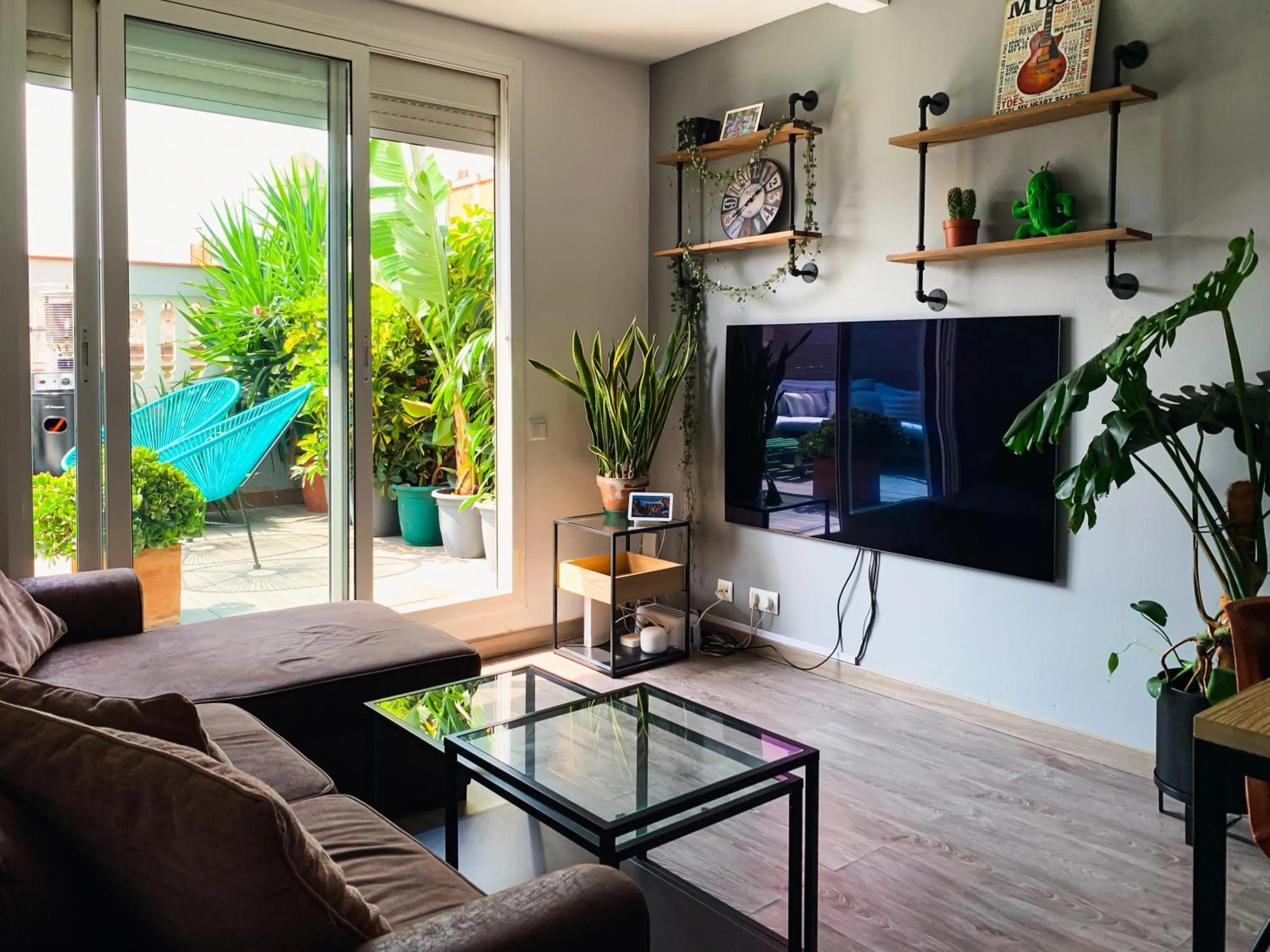 Communal lounge/ TV room in Incredible 2BR Penthouse with Urban Rooftop Garden