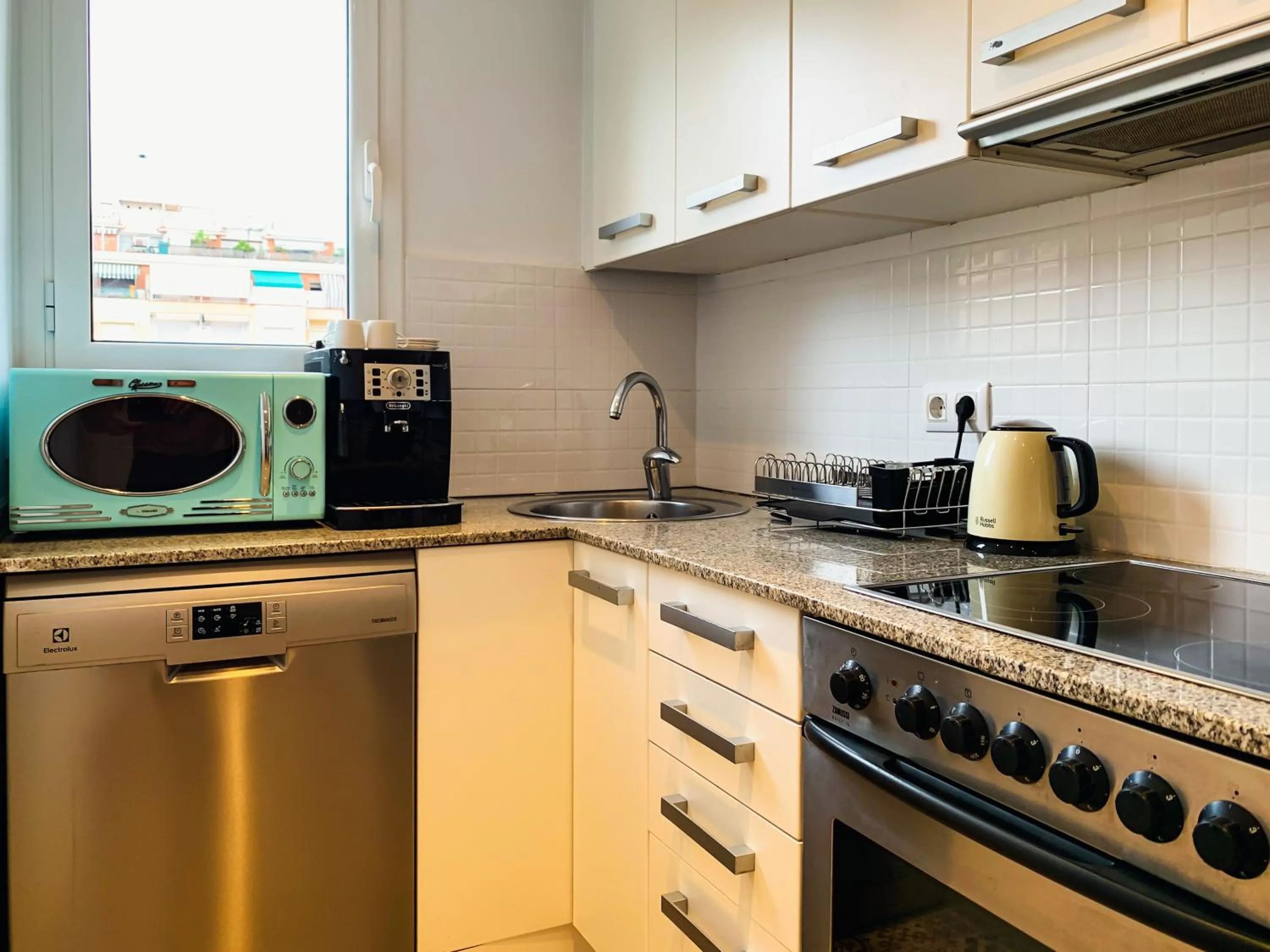 Coffee/tea facilities in Incredible 2BR Penthouse with Urban Rooftop Garden