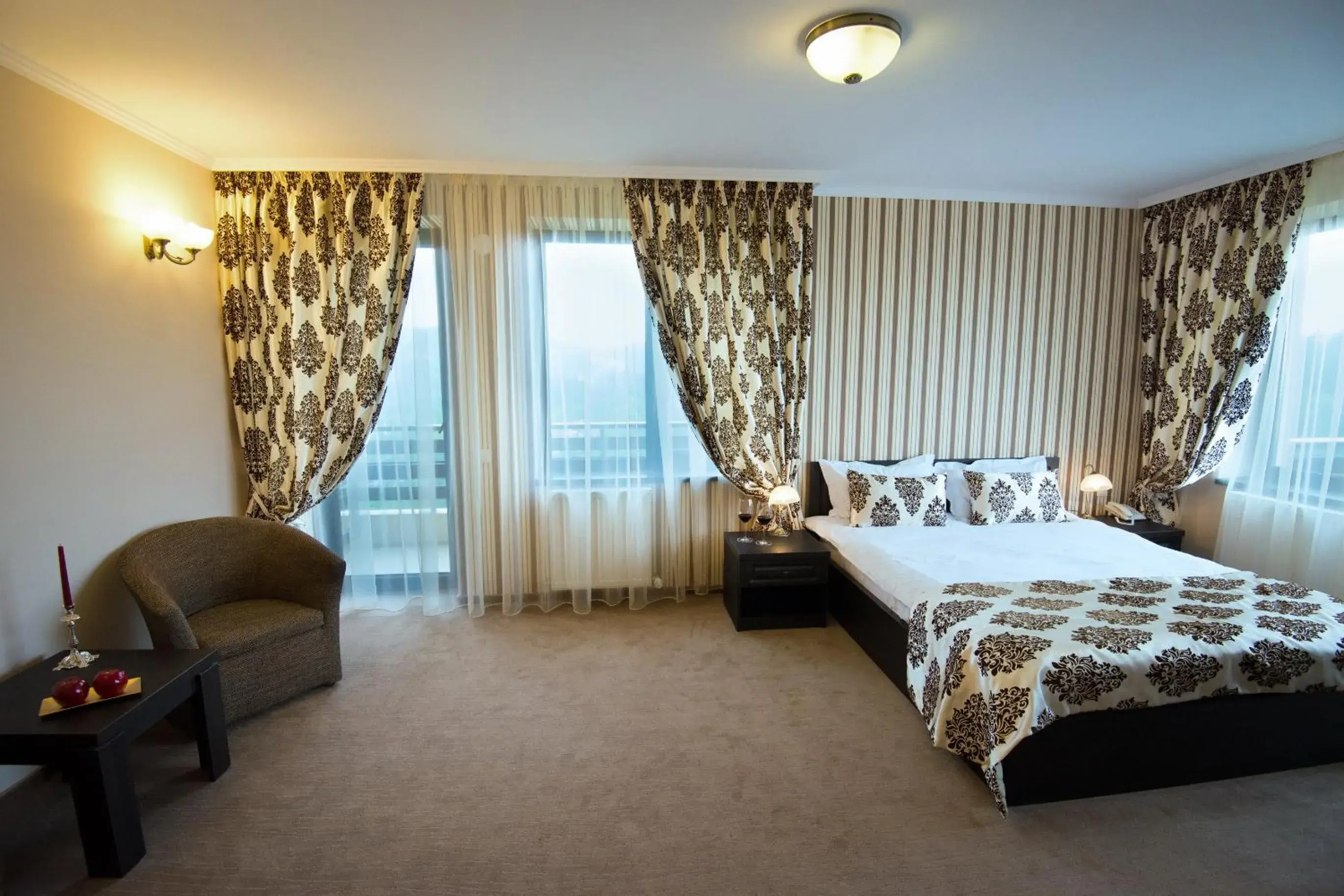 Photo of the whole room, Bed in Pensiunea Toscana Photo of the whole room, Bed in Pensiunea Toscana