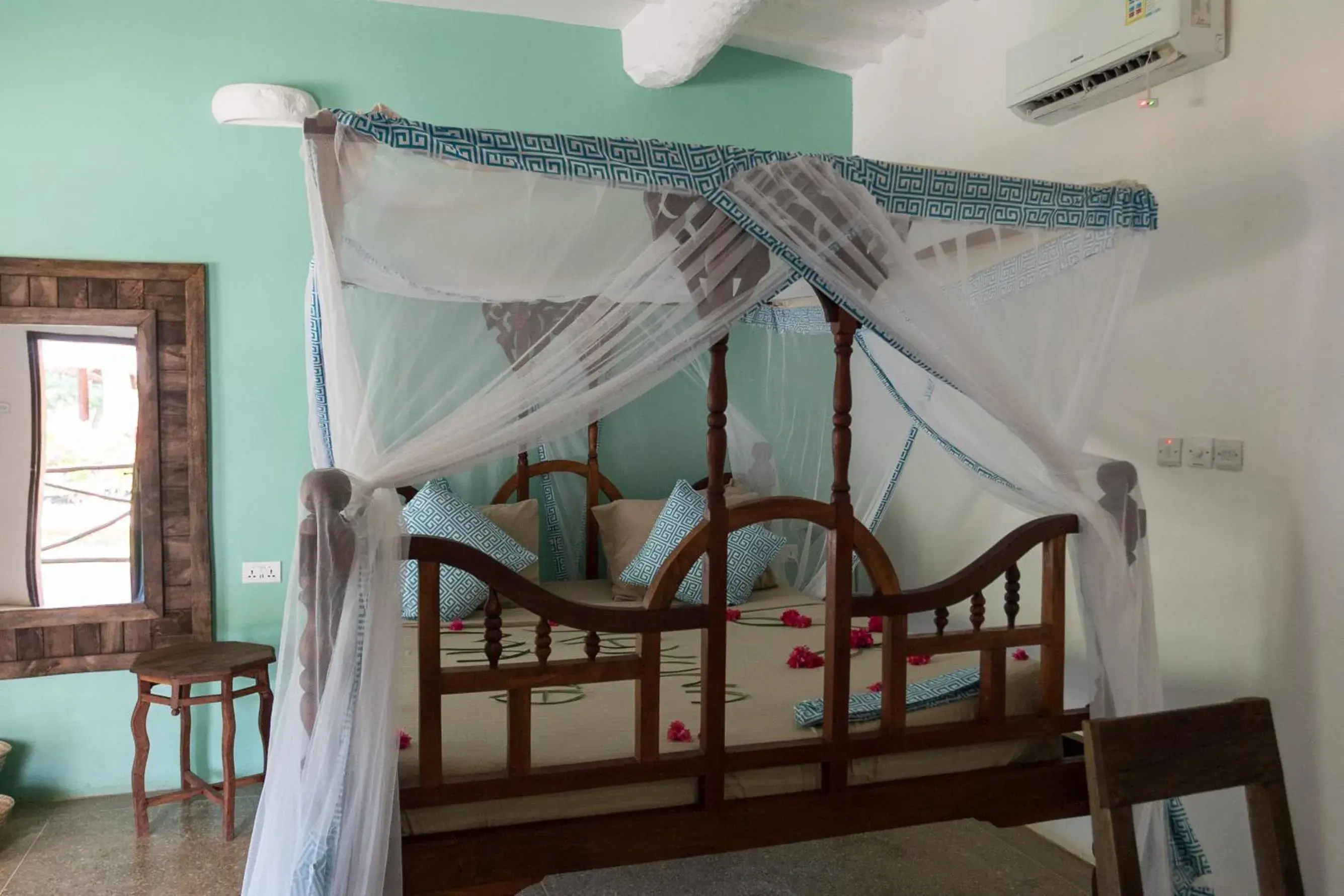 Bed in Reef & Beach Resort - Spa Jambiani Bed in Reef & Beach Resort - Spa Jambiani