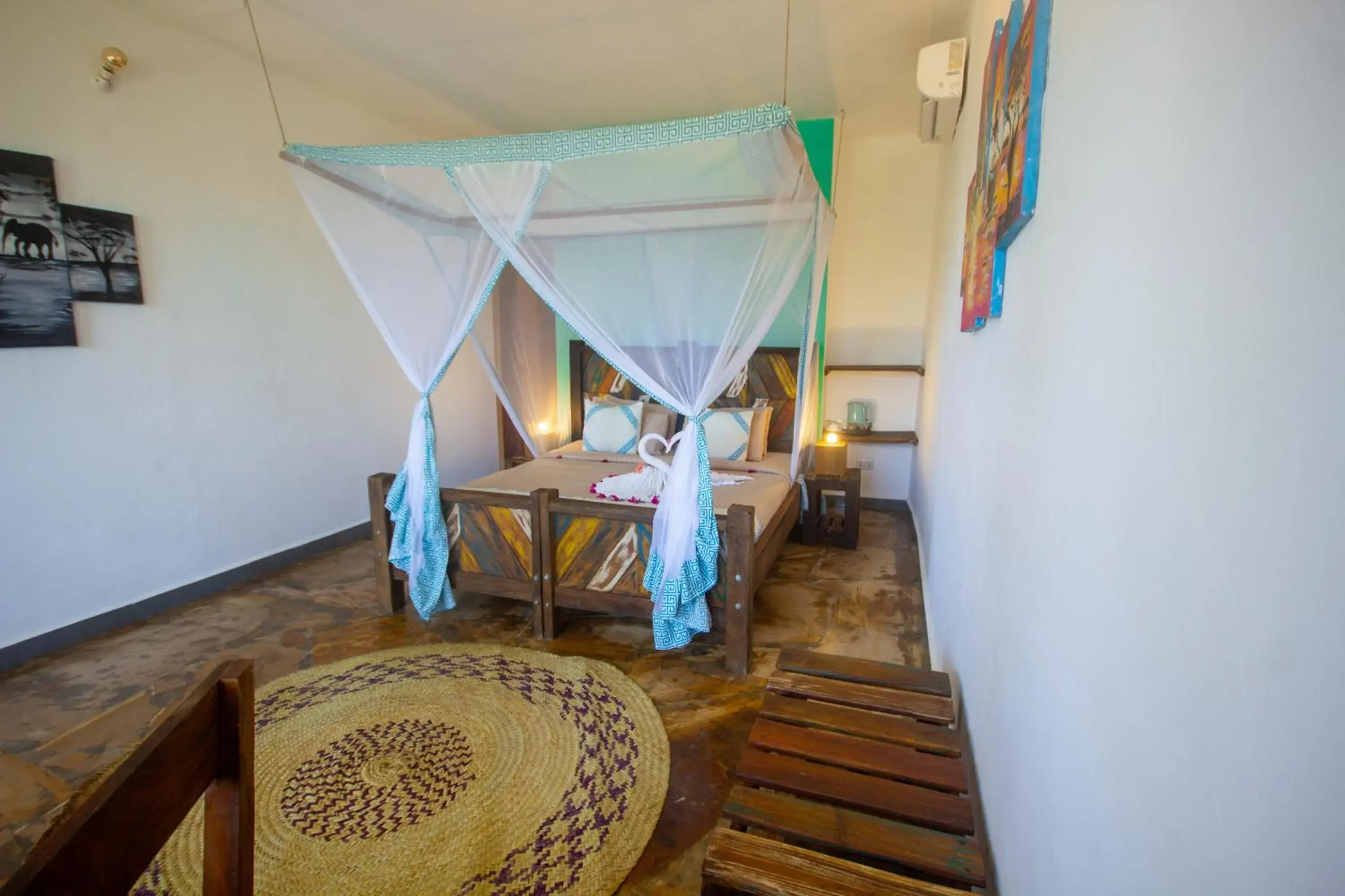 Bed in Reef & Beach Resort - Spa Jambiani Bed in Reef & Beach Resort - Spa Jambiani