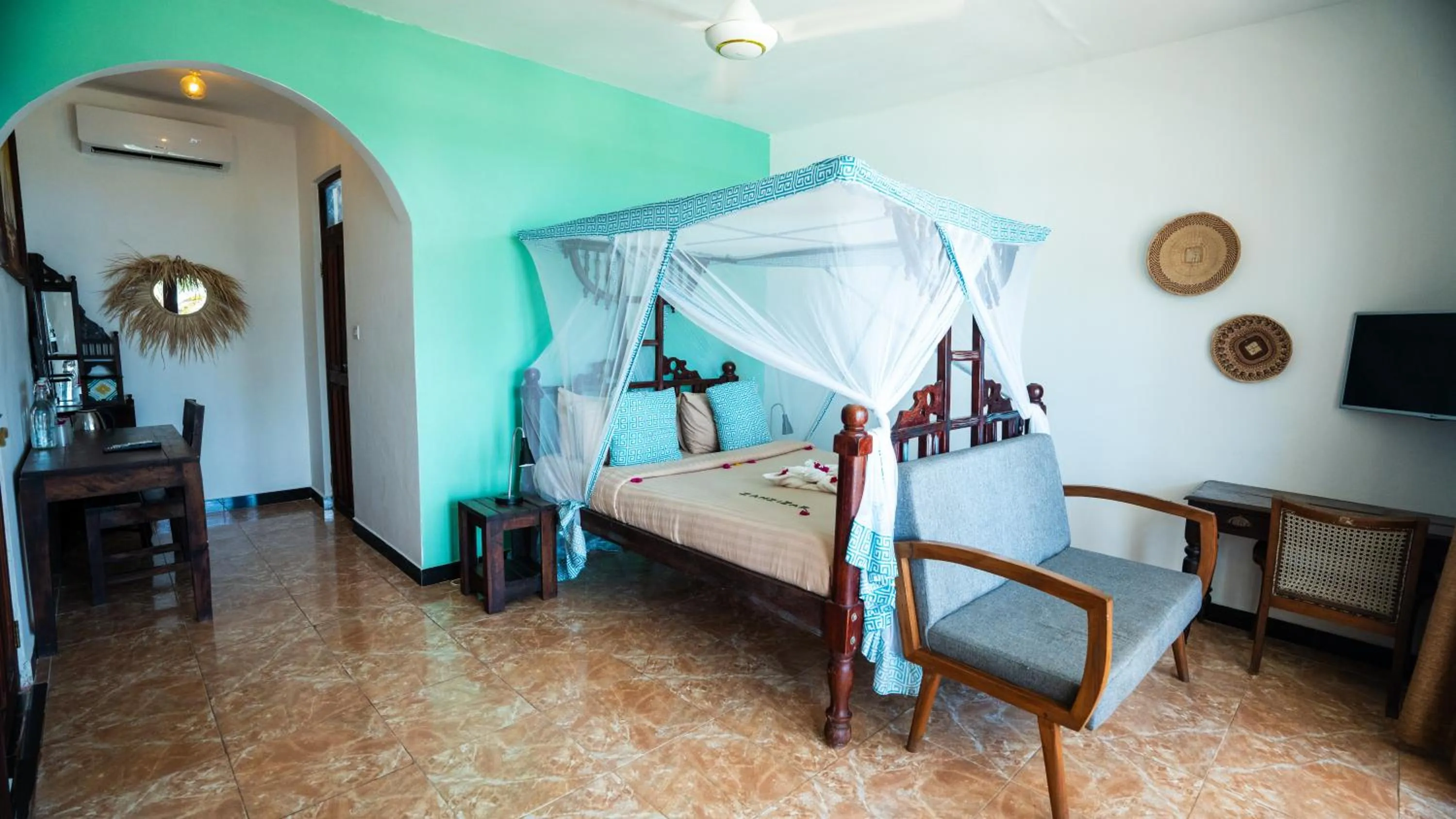 Bed in Reef & Beach Resort - Spa Jambiani