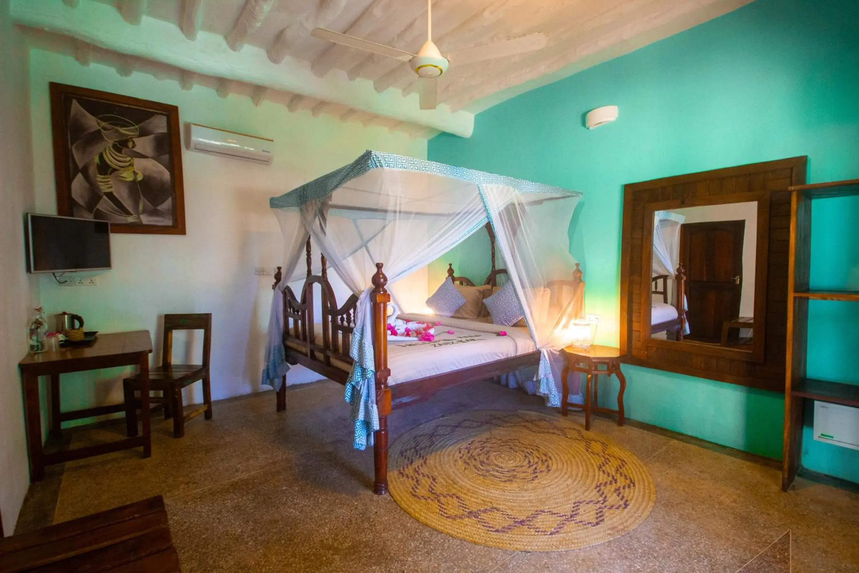 Bed in Reef & Beach Resort - Spa Jambiani Bed in Reef & Beach Resort - Spa Jambiani