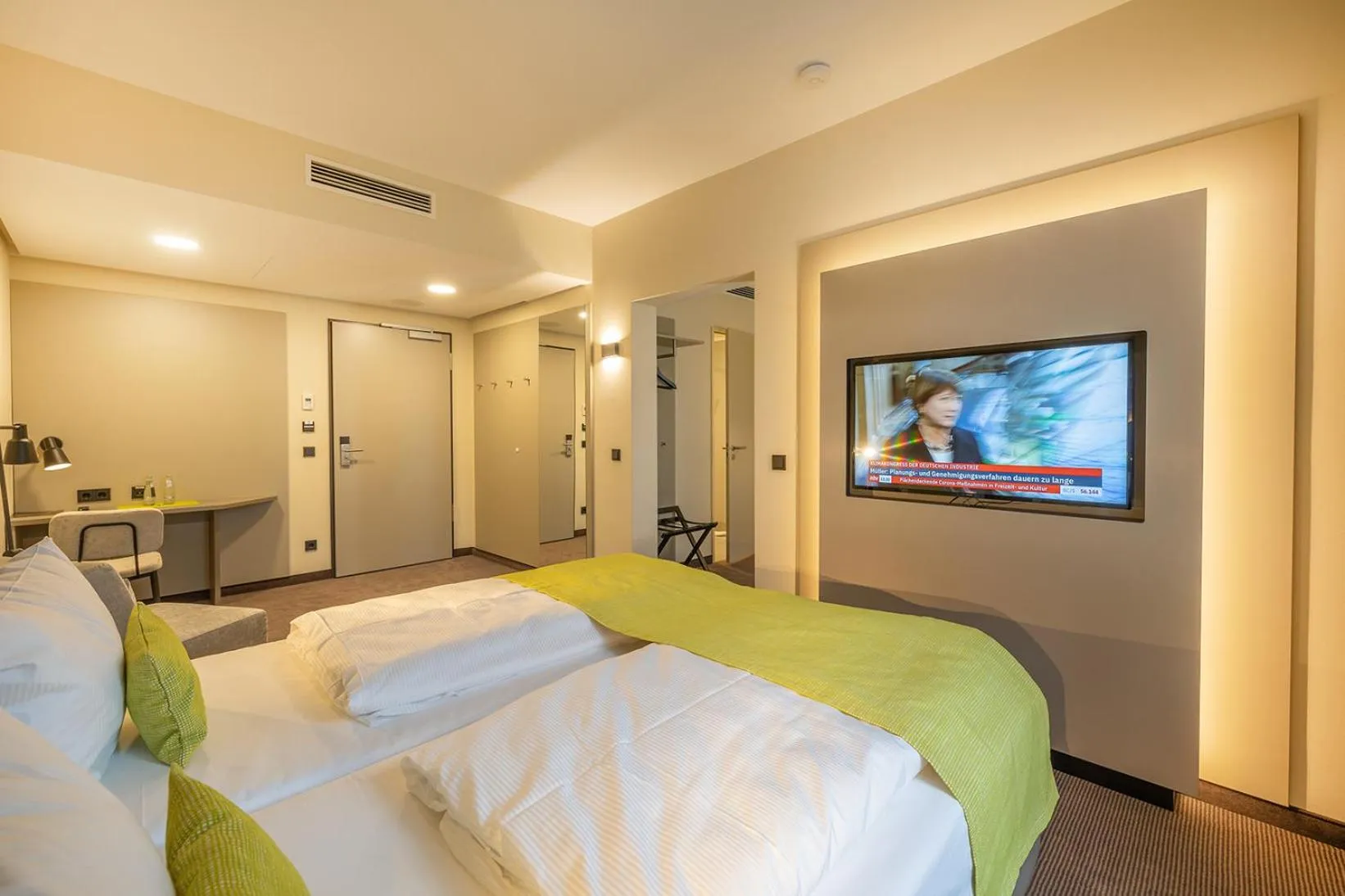 Photo of the whole room, Bed in th Hotel Leipzig Messe