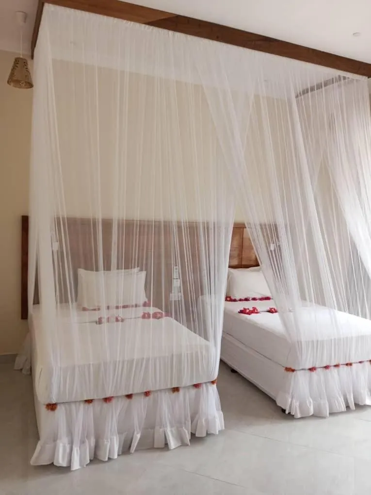 Bedroom, Bed in Sunset Kendwa Beach Hotel