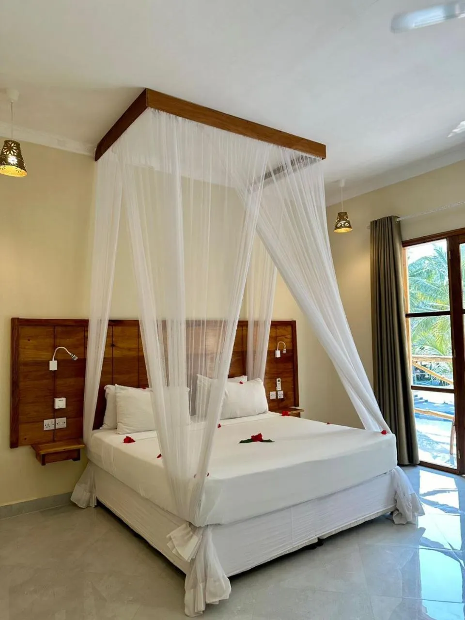 Bed in Sunset Kendwa Beach Hotel