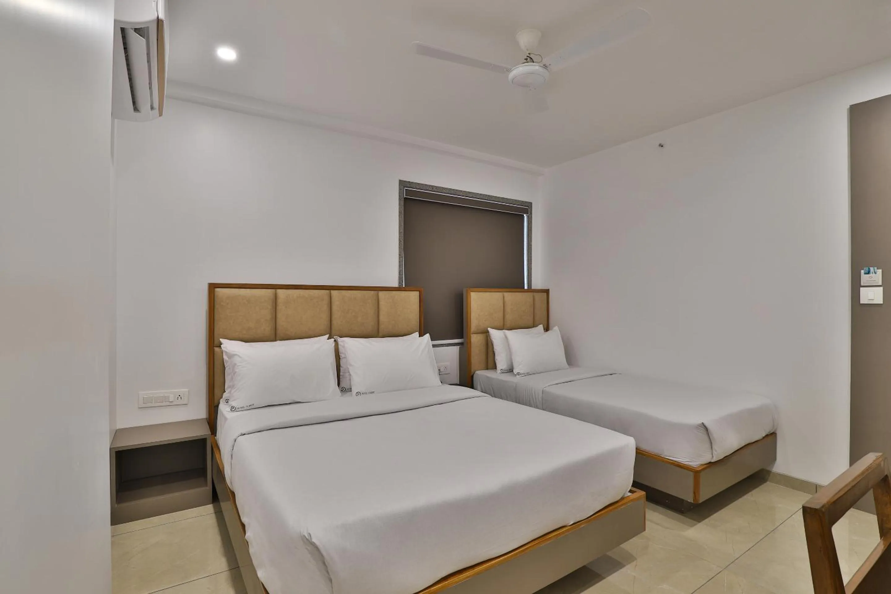 Photo of the whole room, Bed in 7 Orbit Hotel, Surat