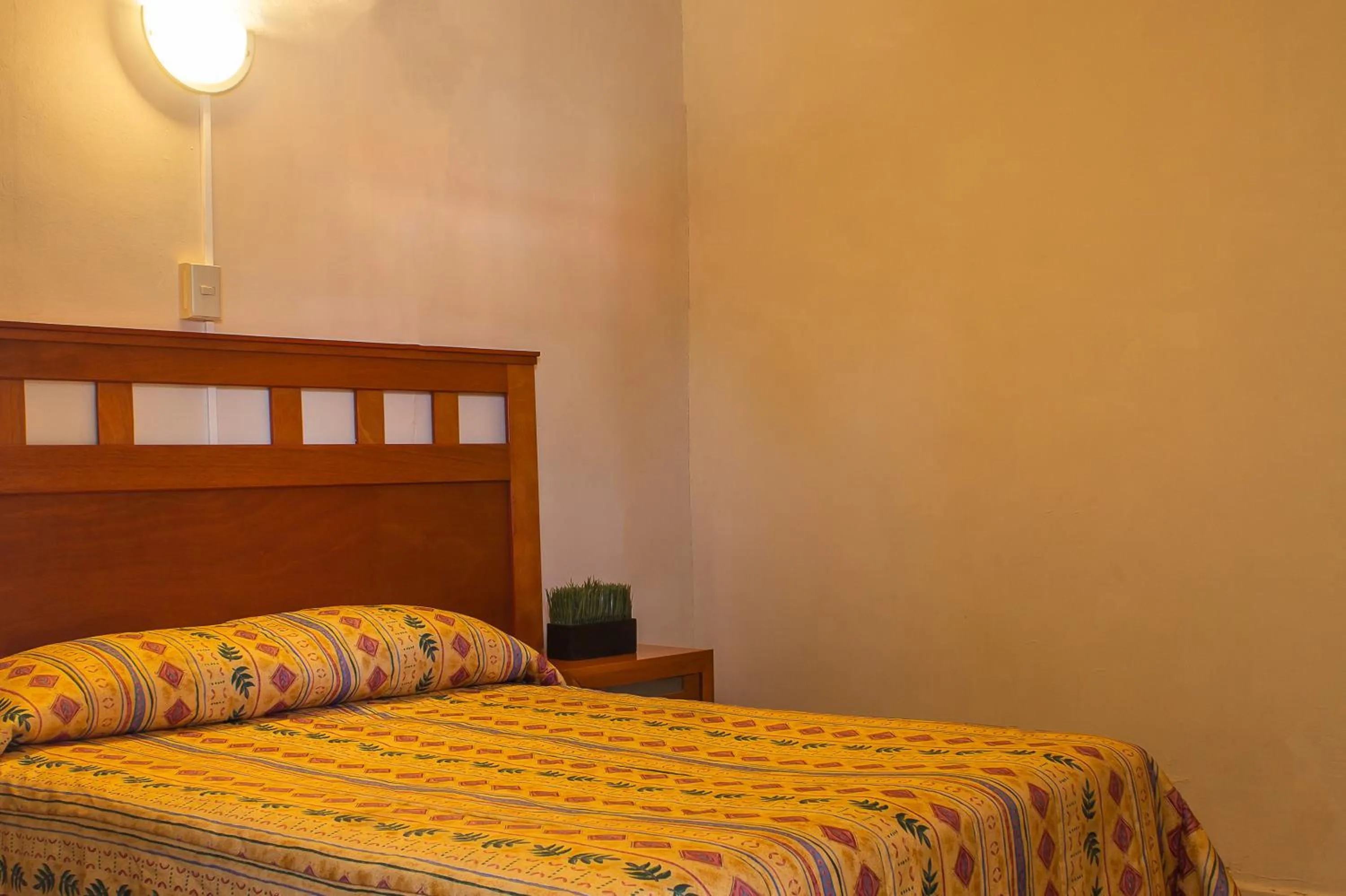 Bed in BONITTO INN® Manuel