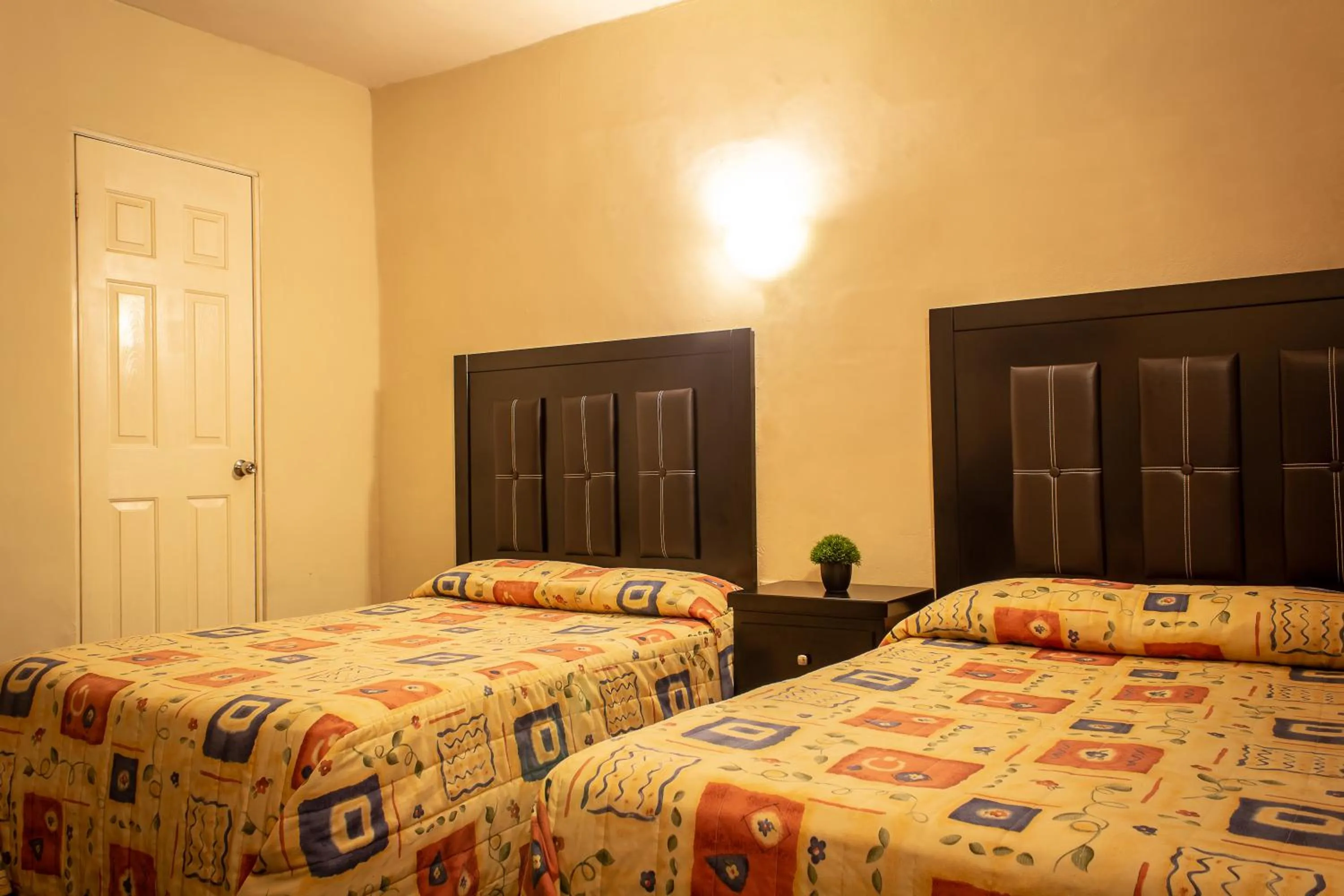 Bed in BONITTO INN® Manuel