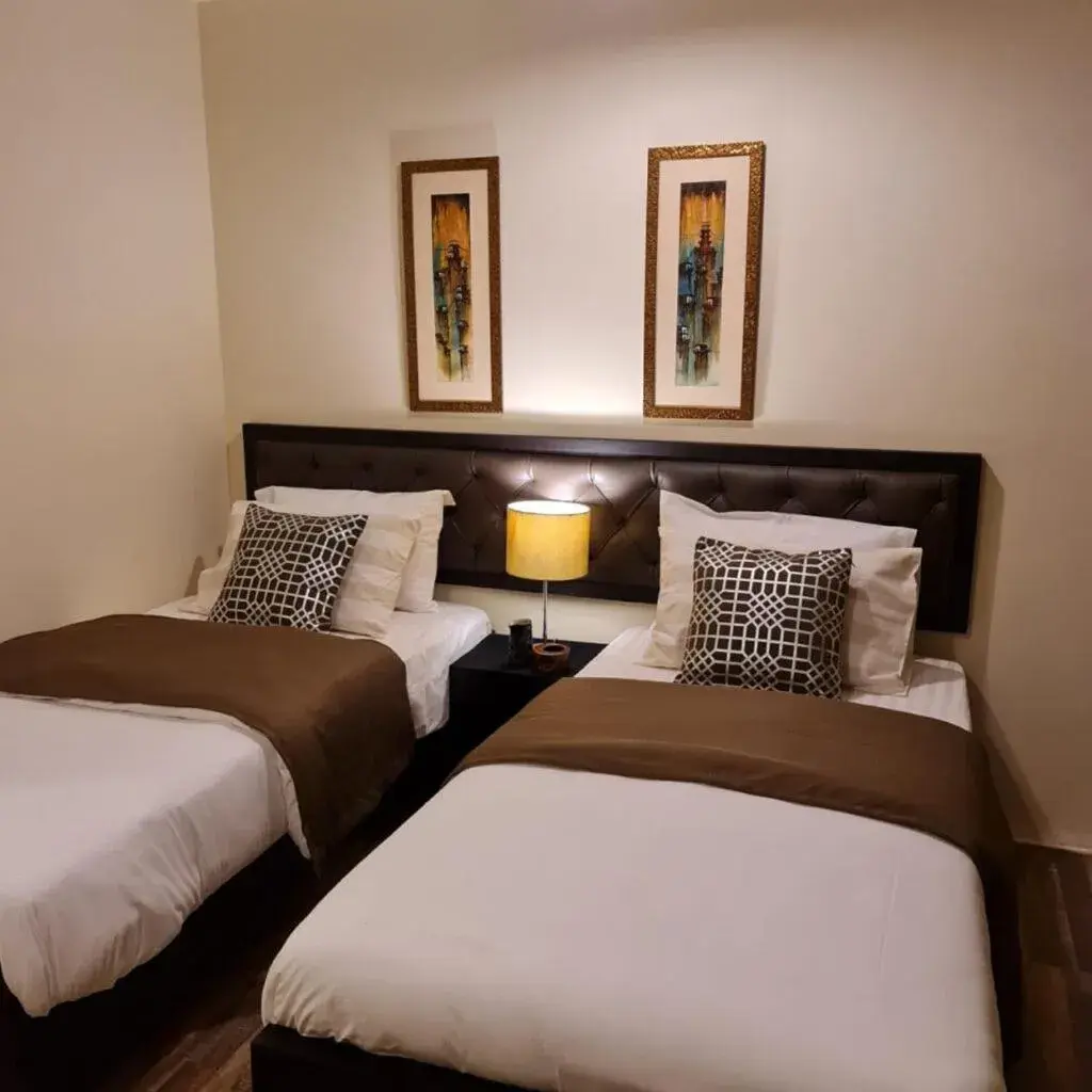 Bed in The Mandarin Inn Bed in The Mandarin Inn