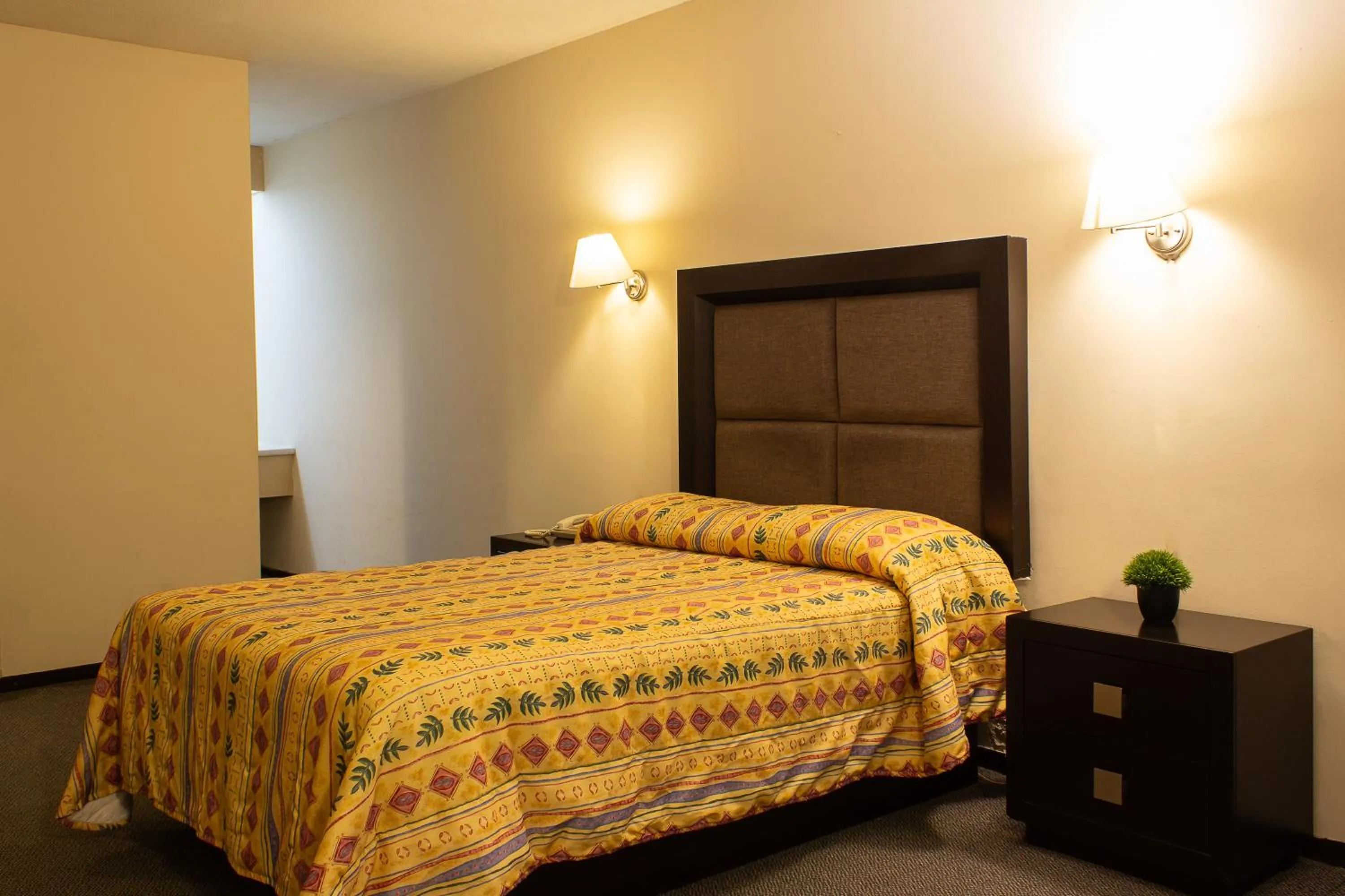 Bed in BONITTO INN® Gonzalez