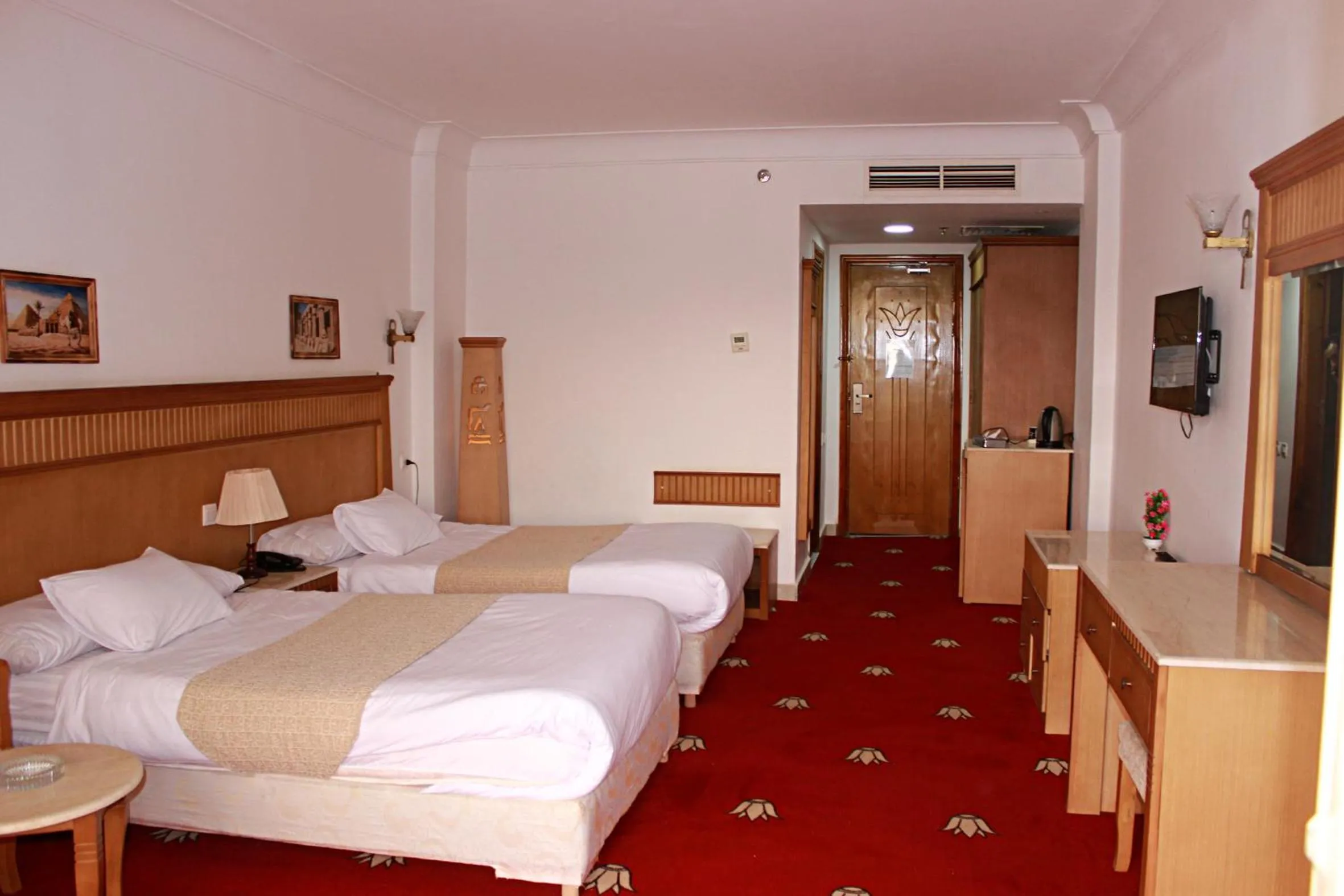 Photo of the whole room, Bed in Regency Pyramids Hotel
