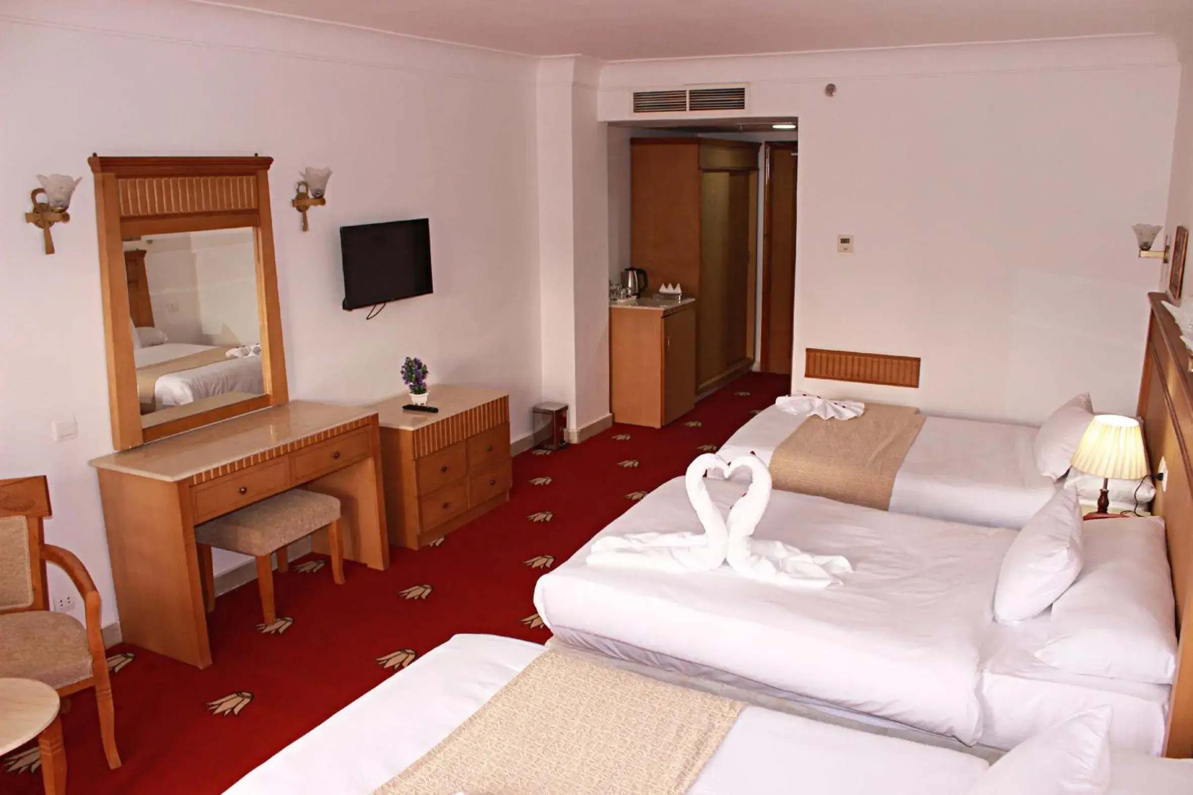 Deluxe Triple Room in Regency Pyramids Hotel Deluxe Triple Room in Regency Pyramids Hotel