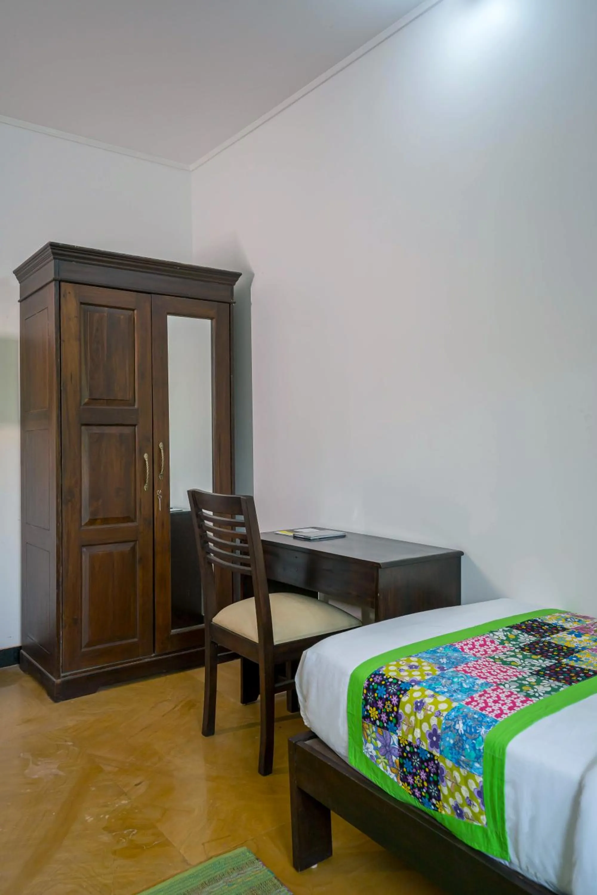 wardrobe, Bed in Sarth Ayurveda Retreat and Wellness Centre