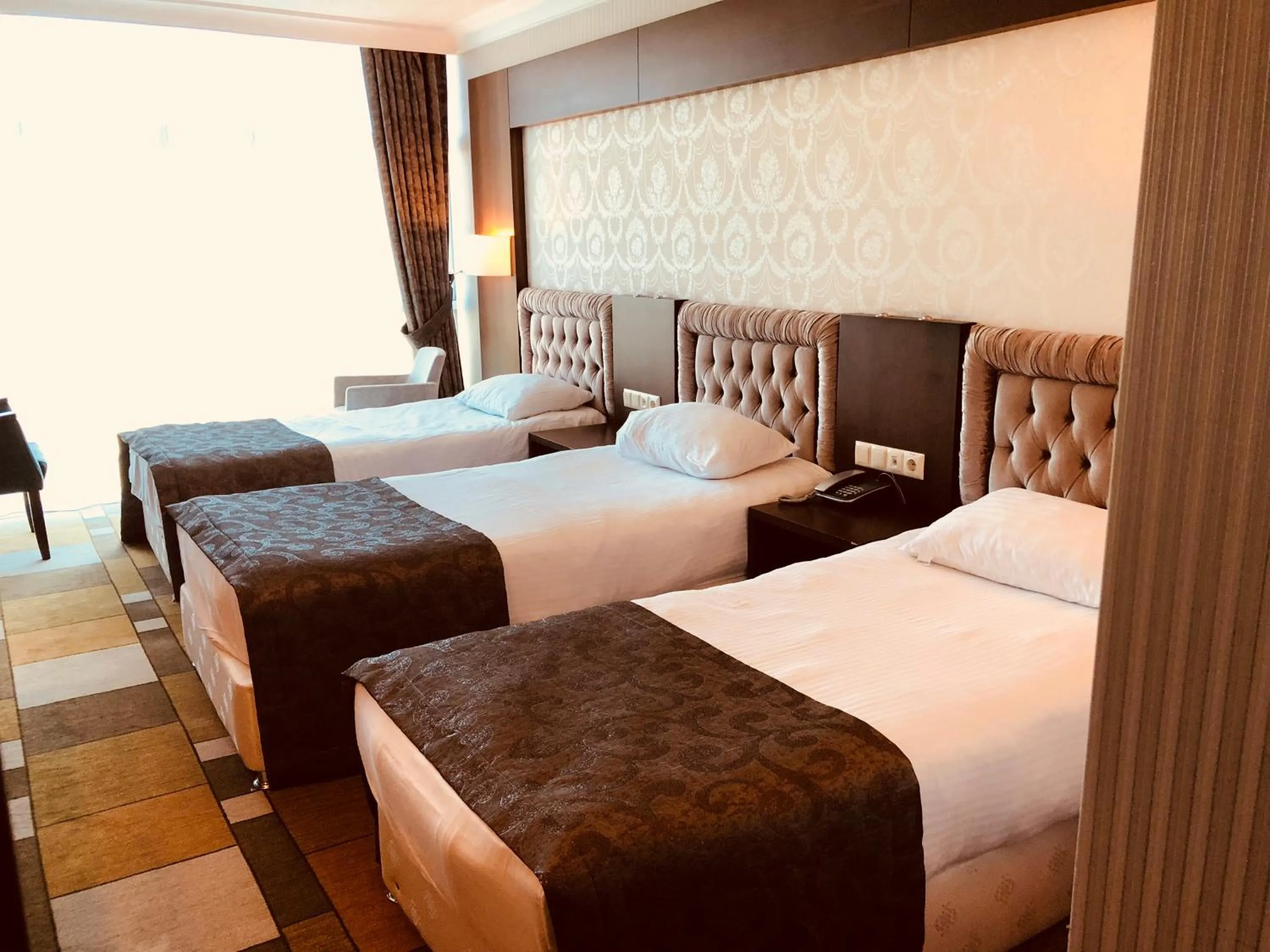 Bed in Grand Amisos Hotel