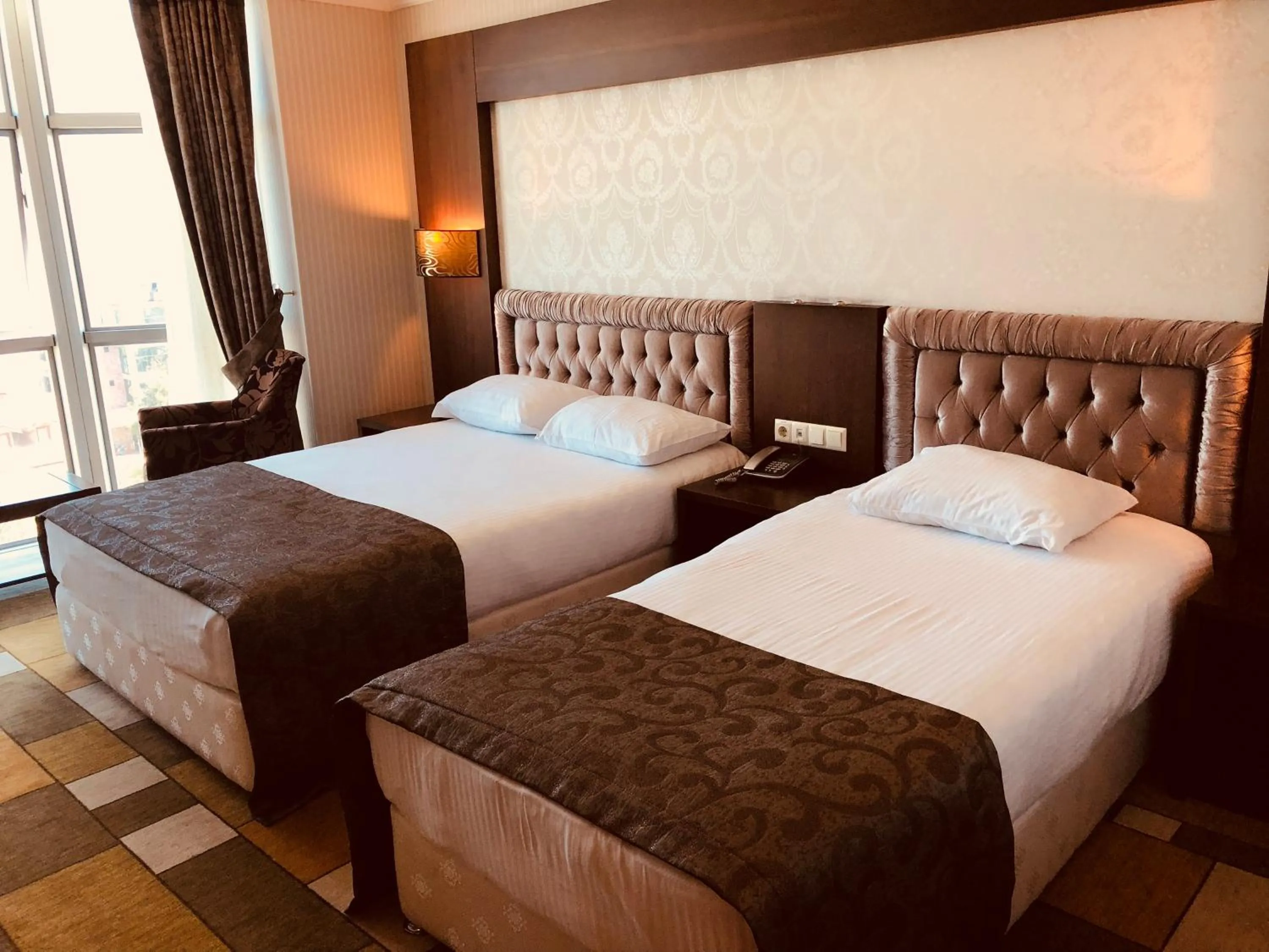 Bed in Grand Amisos Hotel