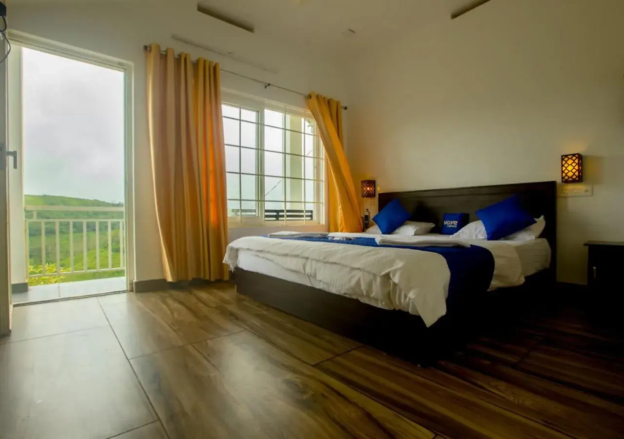 Bed in White Stone Vagamon Hilltop Cottage by VOYE HOMES Bed in White Stone Vagamon Hilltop Cottage by VOYE HOMES