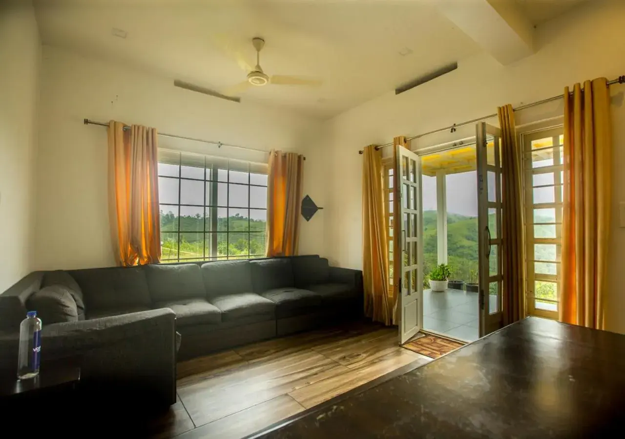 Living room in White Stone Vagamon Hilltop Cottage by VOYE HOMES Living room in White Stone Vagamon Hilltop Cottage by VOYE HOMES