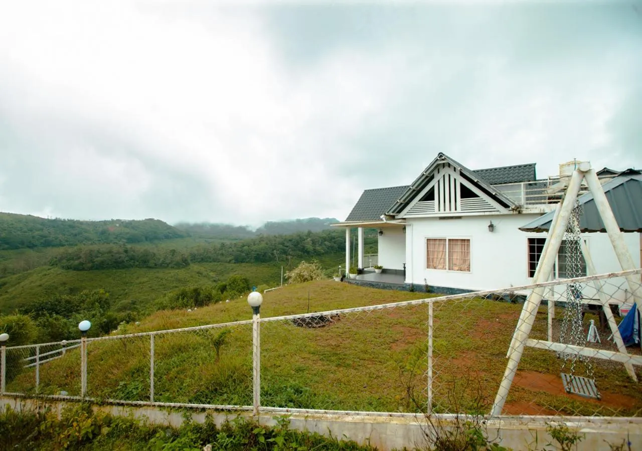 Property building in White Stone Vagamon Hilltop Cottage by VOYE HOMES