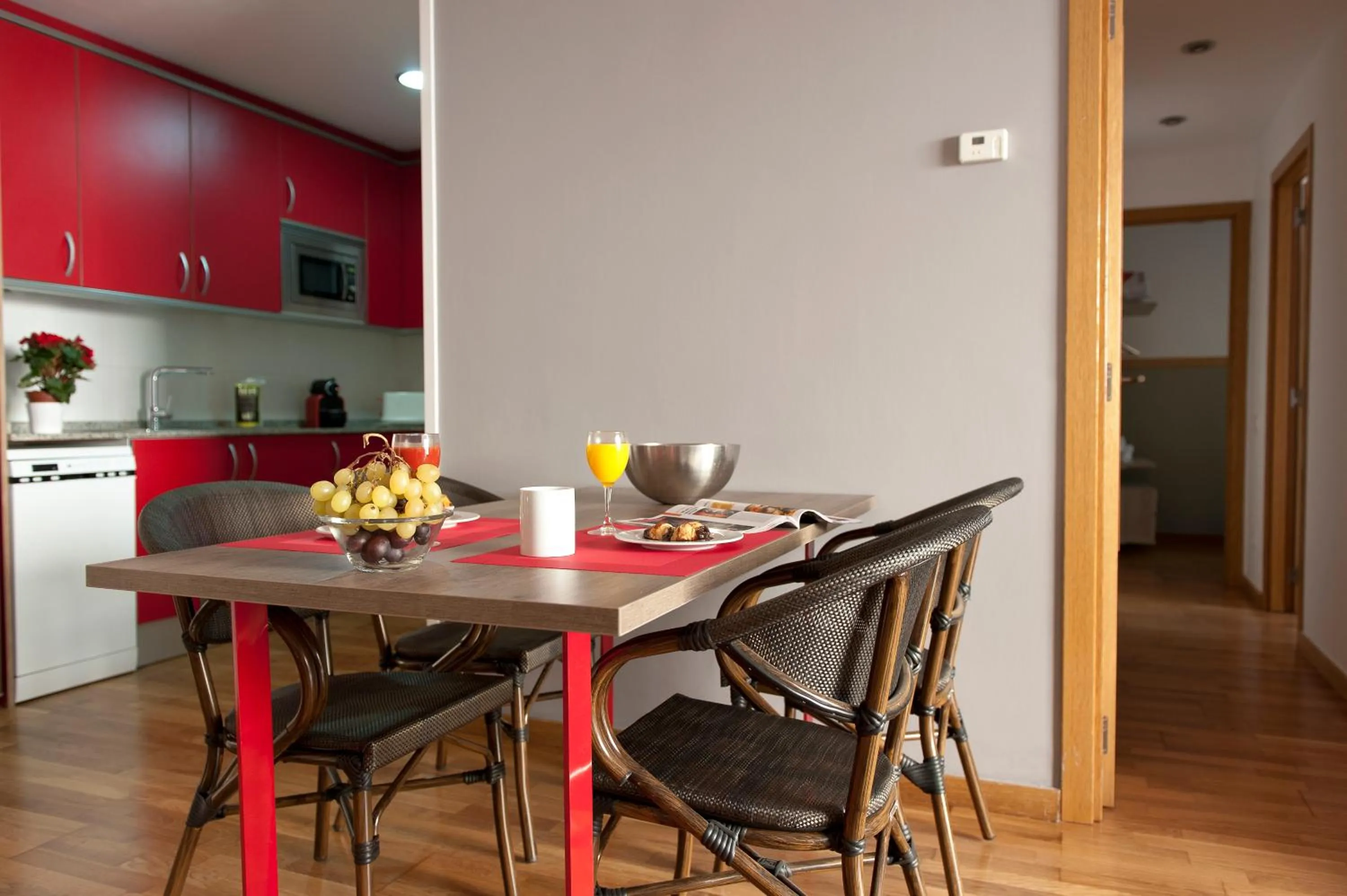 Dining area in MH Apartments Gracia