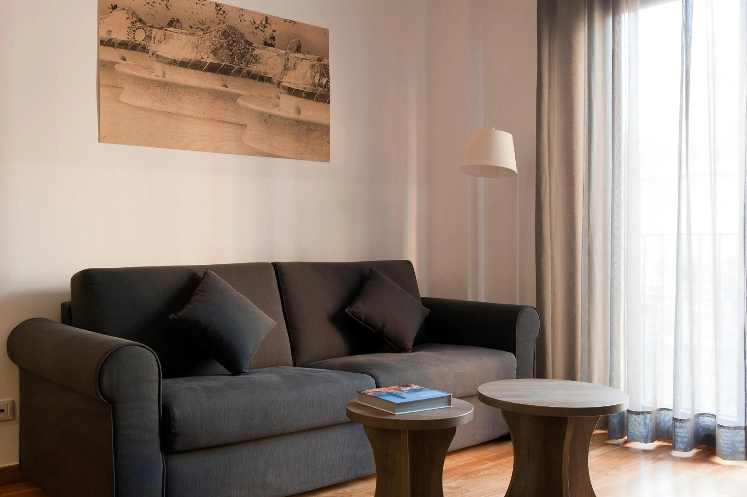 Seating area in MH Apartments Gracia