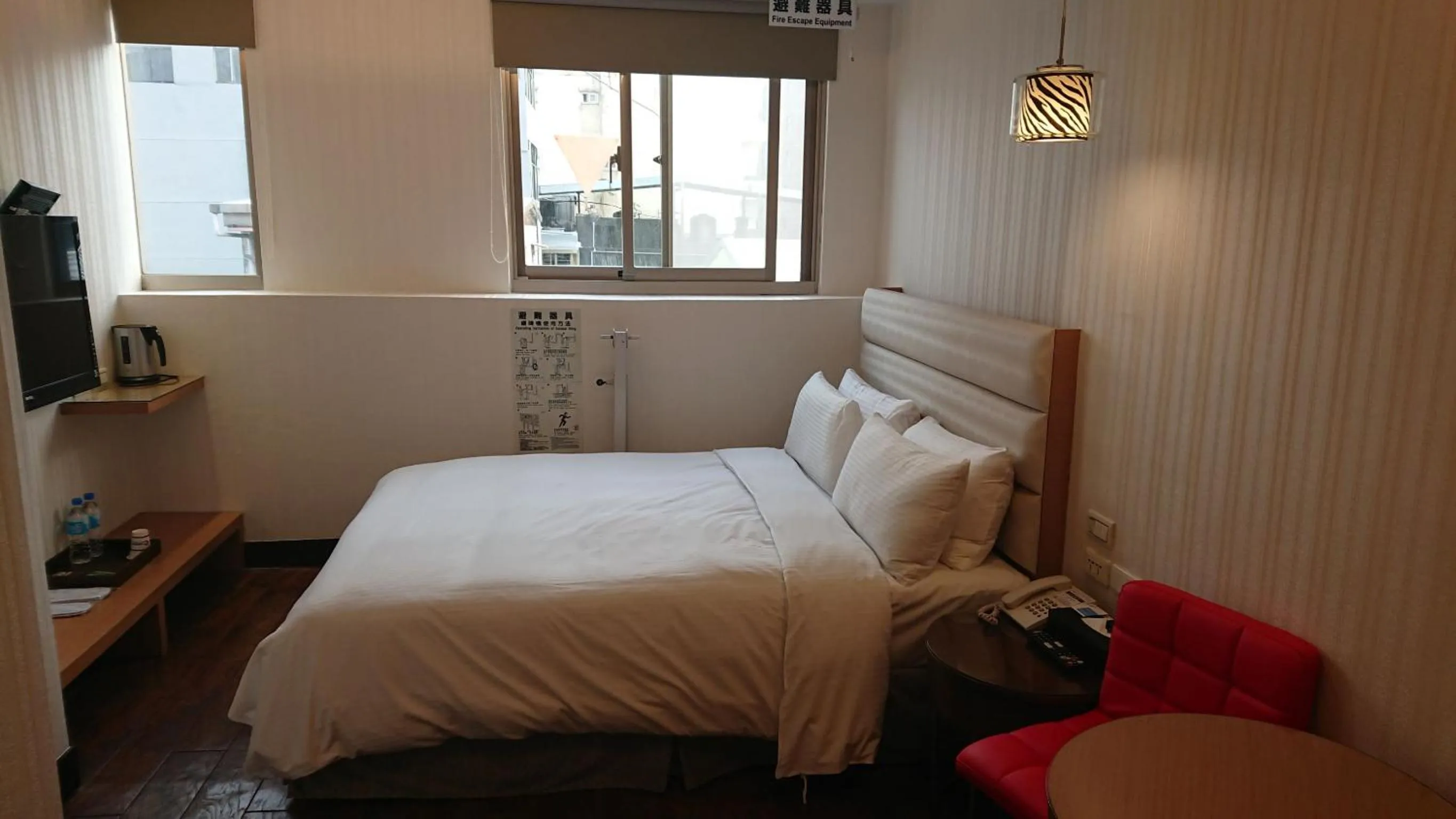 Photo of the whole room, Bed in E-Coast Star Hotel