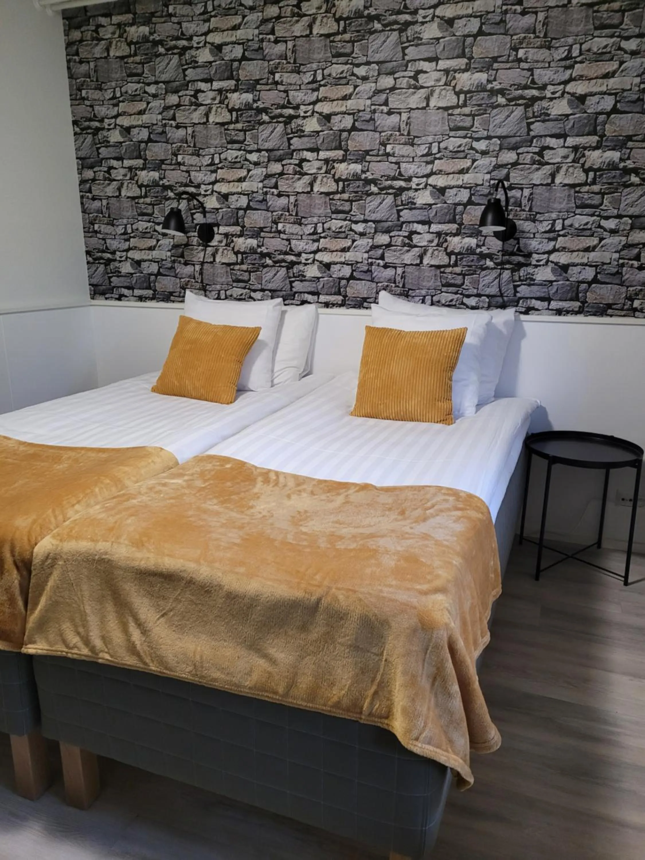 Photo of the whole room, Bed in Hotelli Salpakangas