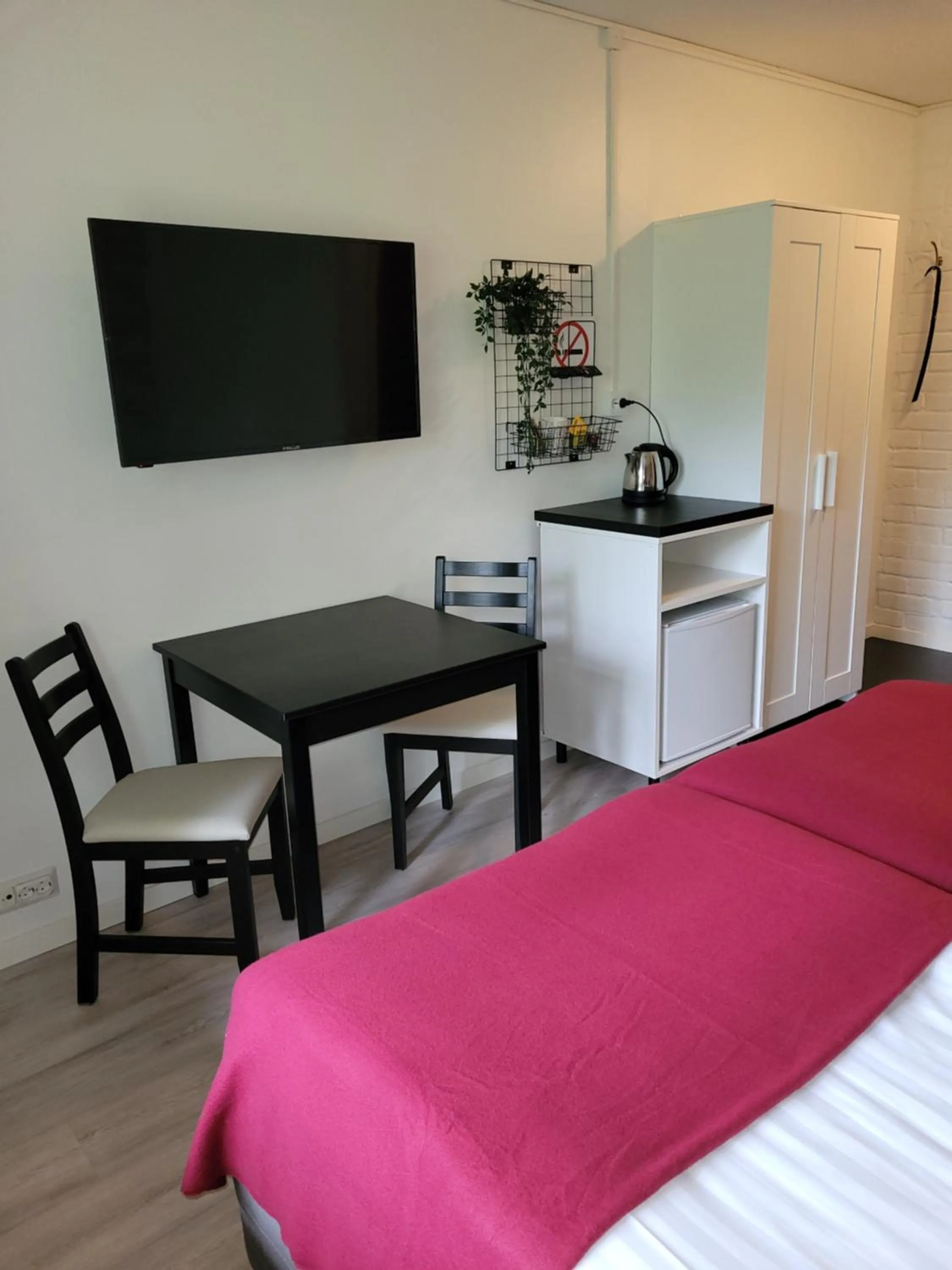 Photo of the whole room, Bed in Hotelli Salpakangas