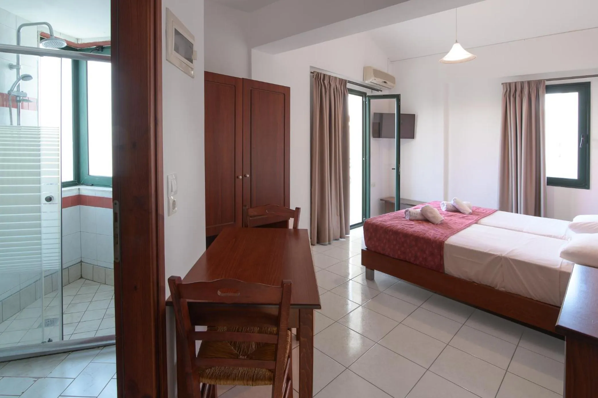 Bed in Ariadni Palace Apartments