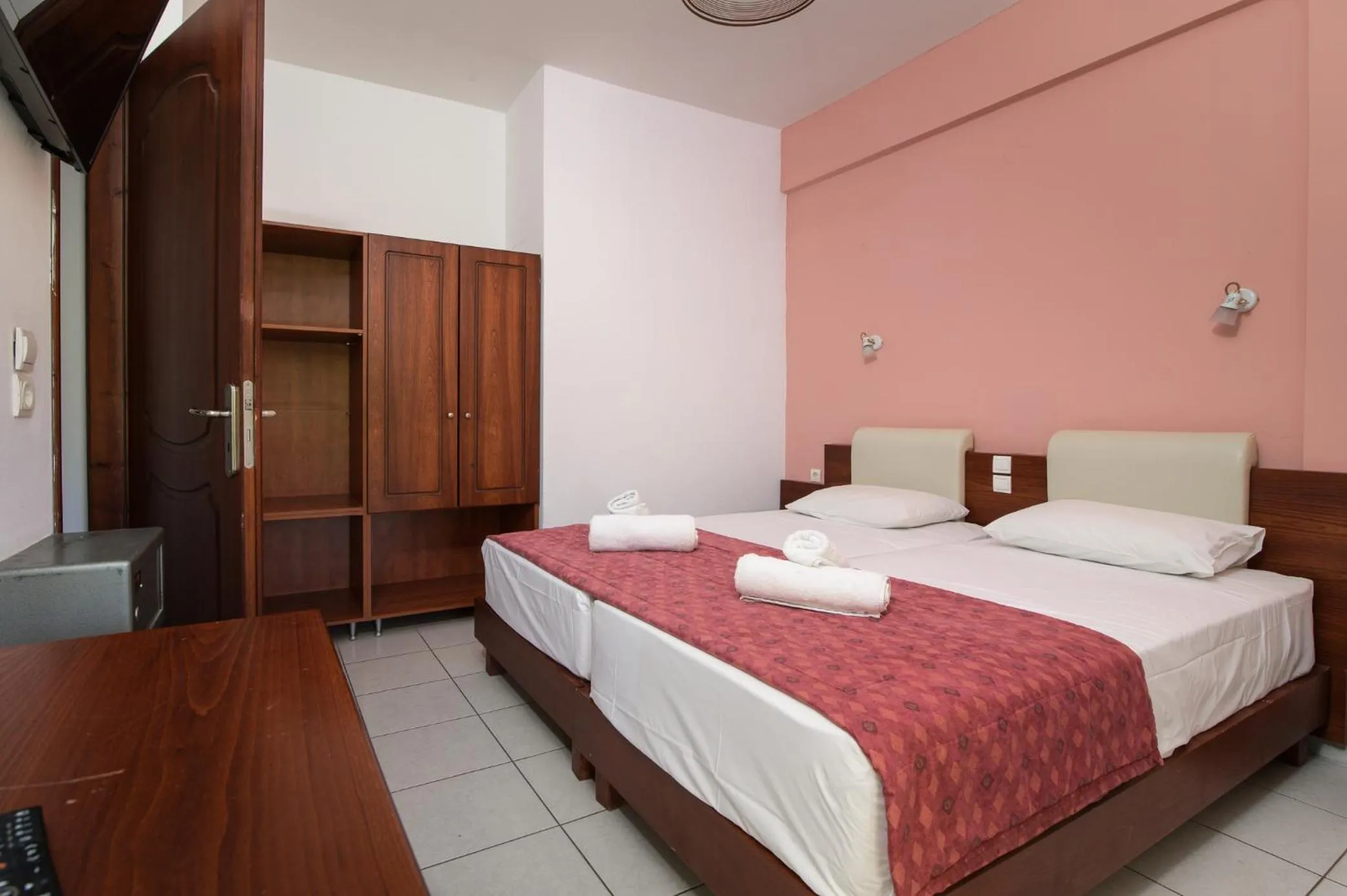 Bed in Ariadni Palace Apartments