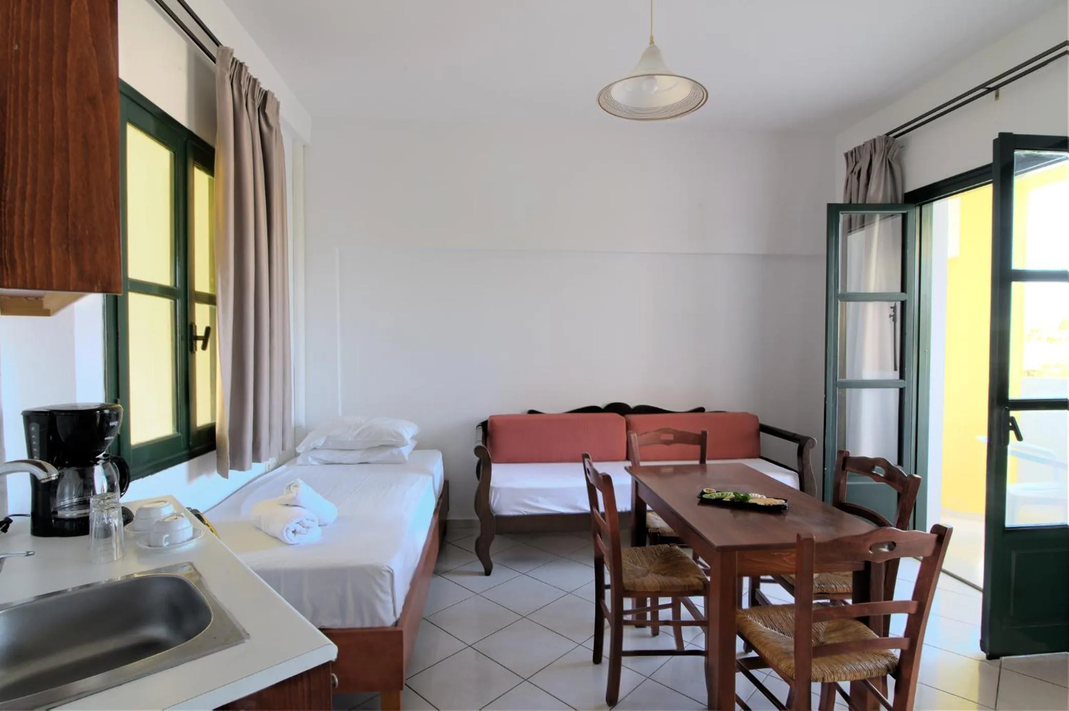 Living room, Bed in Ariadni Palace Apartments