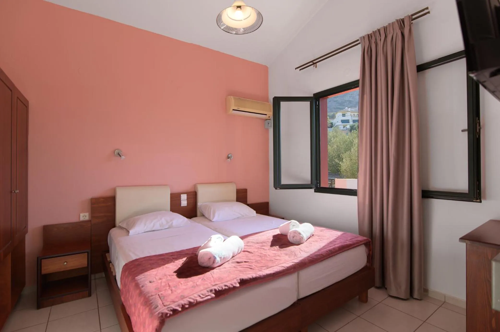 Bed in Ariadni Palace Apartments