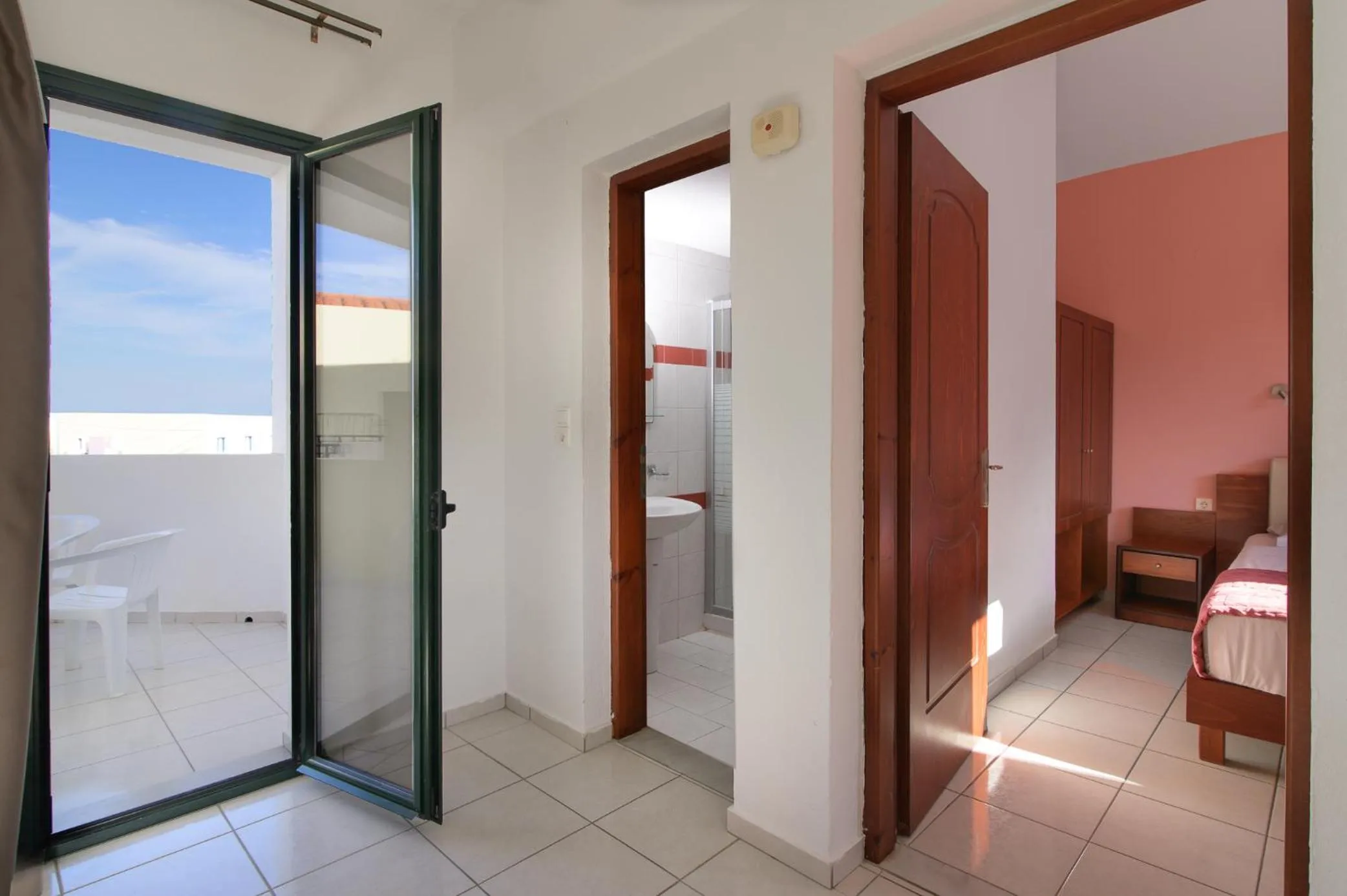 Bed in Ariadni Palace Apartments