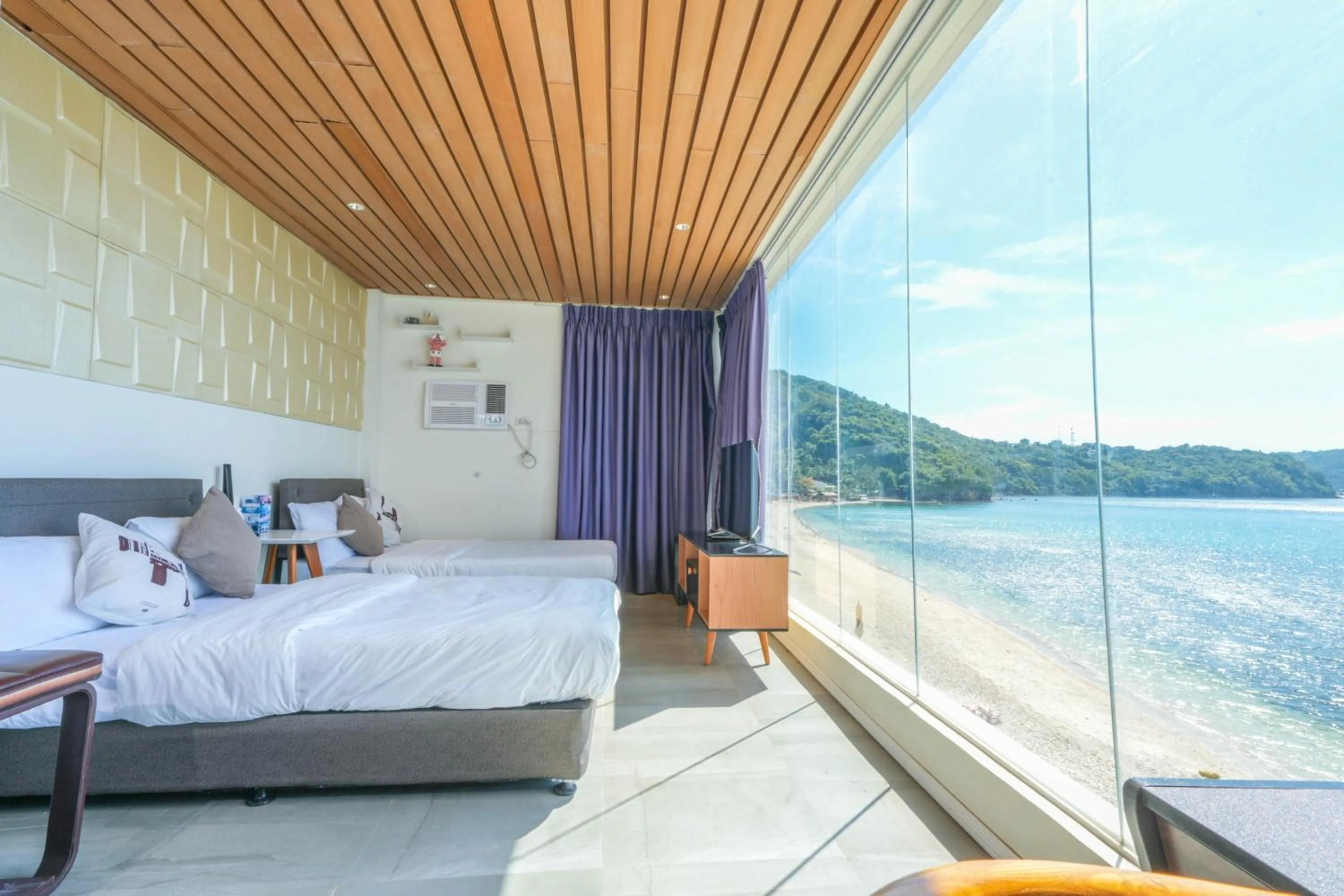 Bed in Destino Beach Resort and Hotel