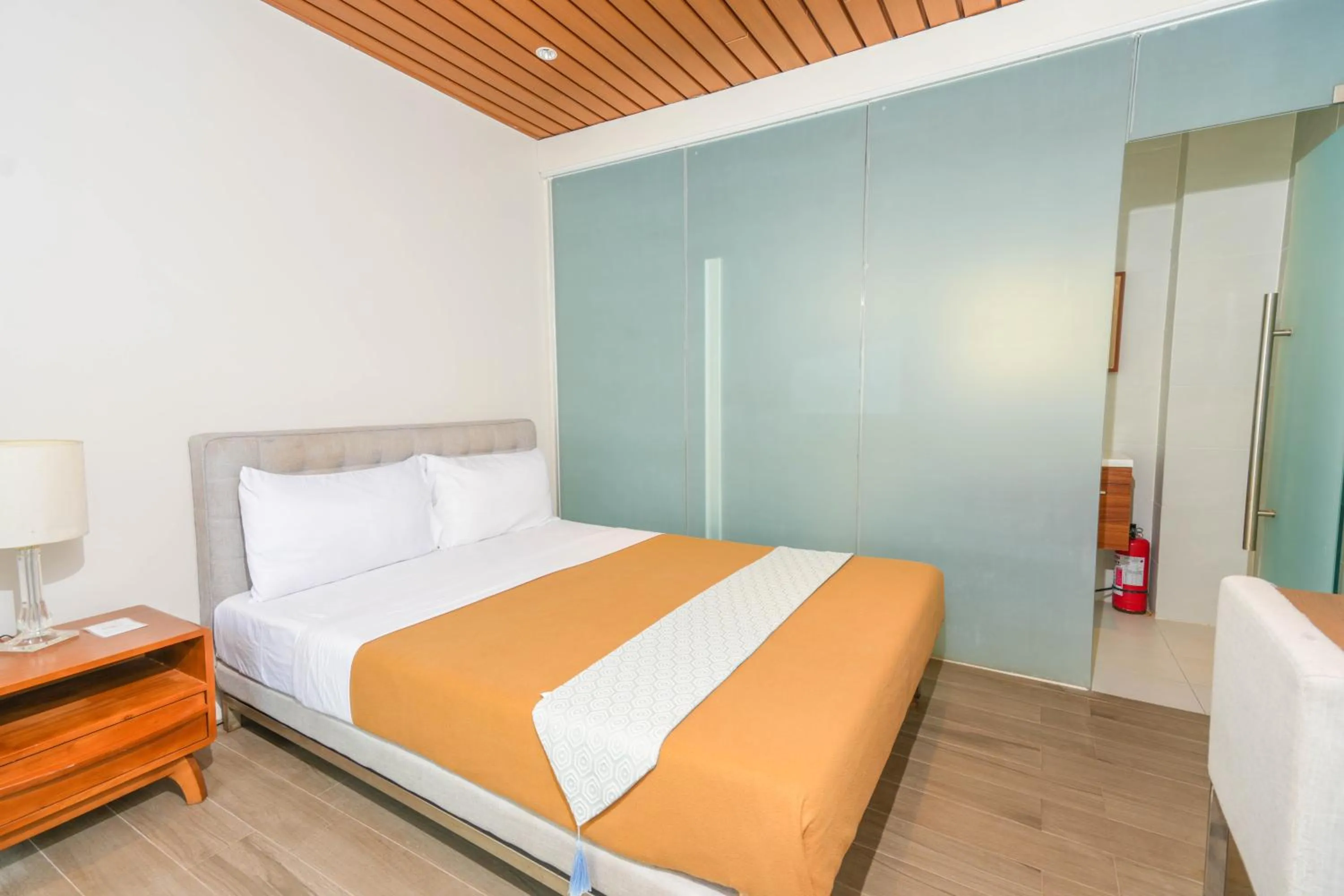 Bed in Destino Beach Resort and Hotel