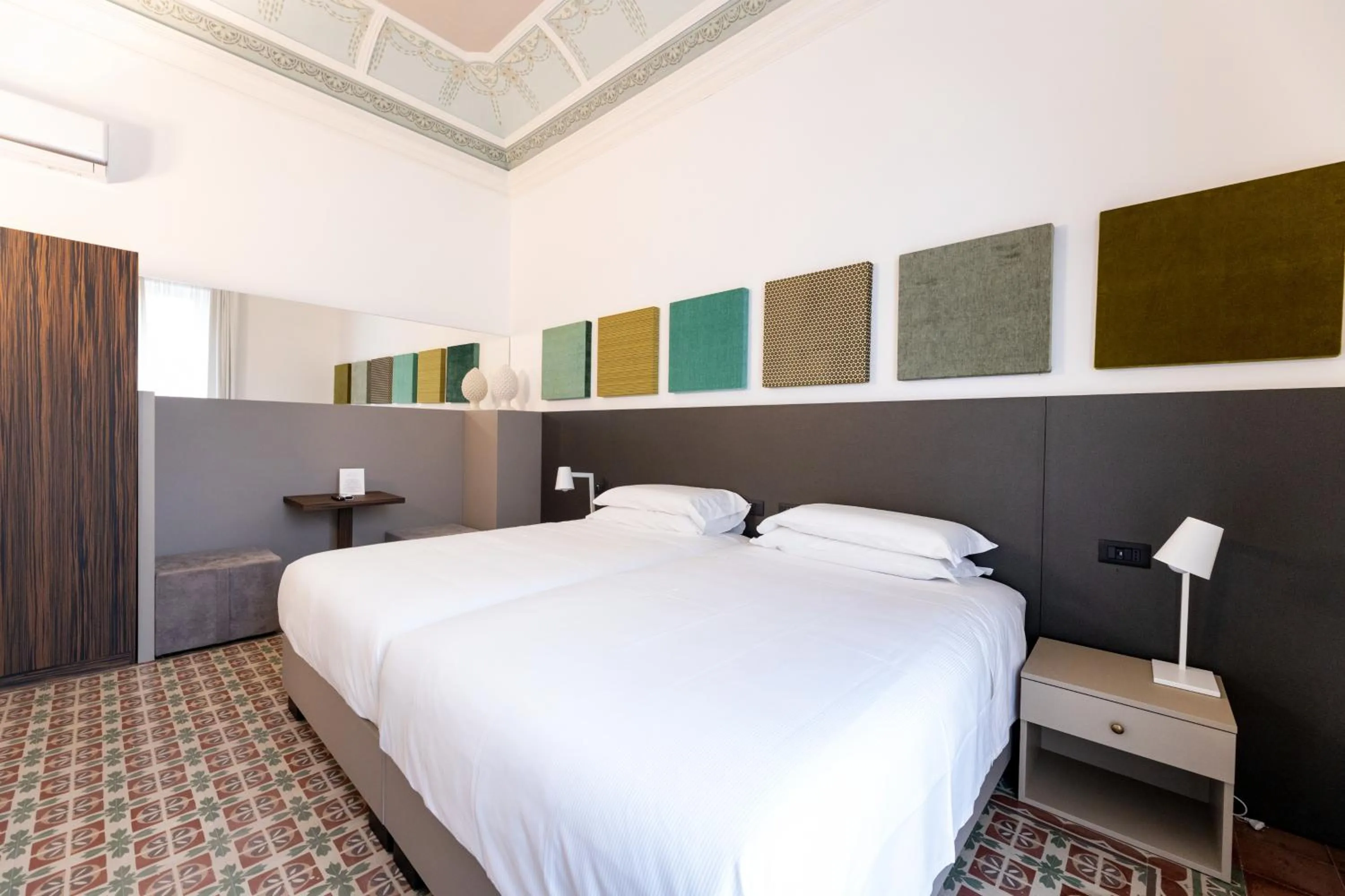 Bed in Riflessi Acireale Palace Suites