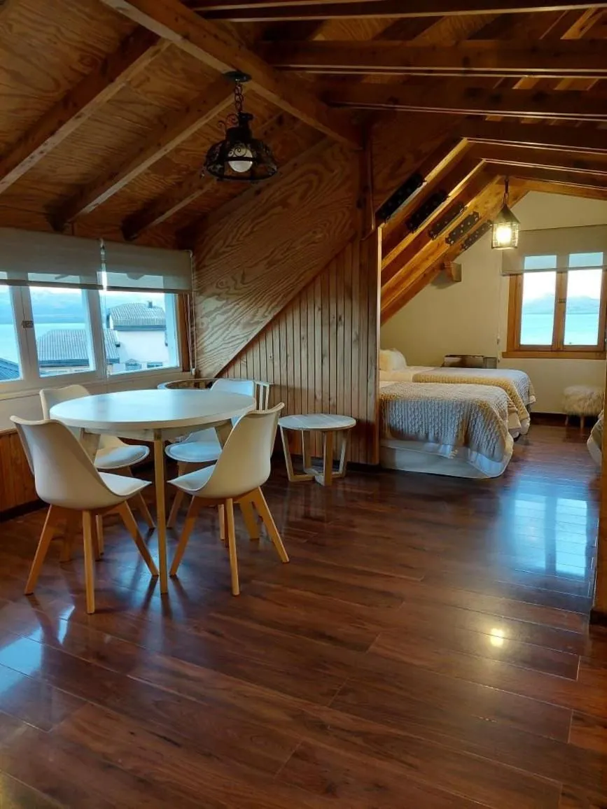 Dining area, Bed in Departamento completo en San Carlos de Bariloche, Argentina