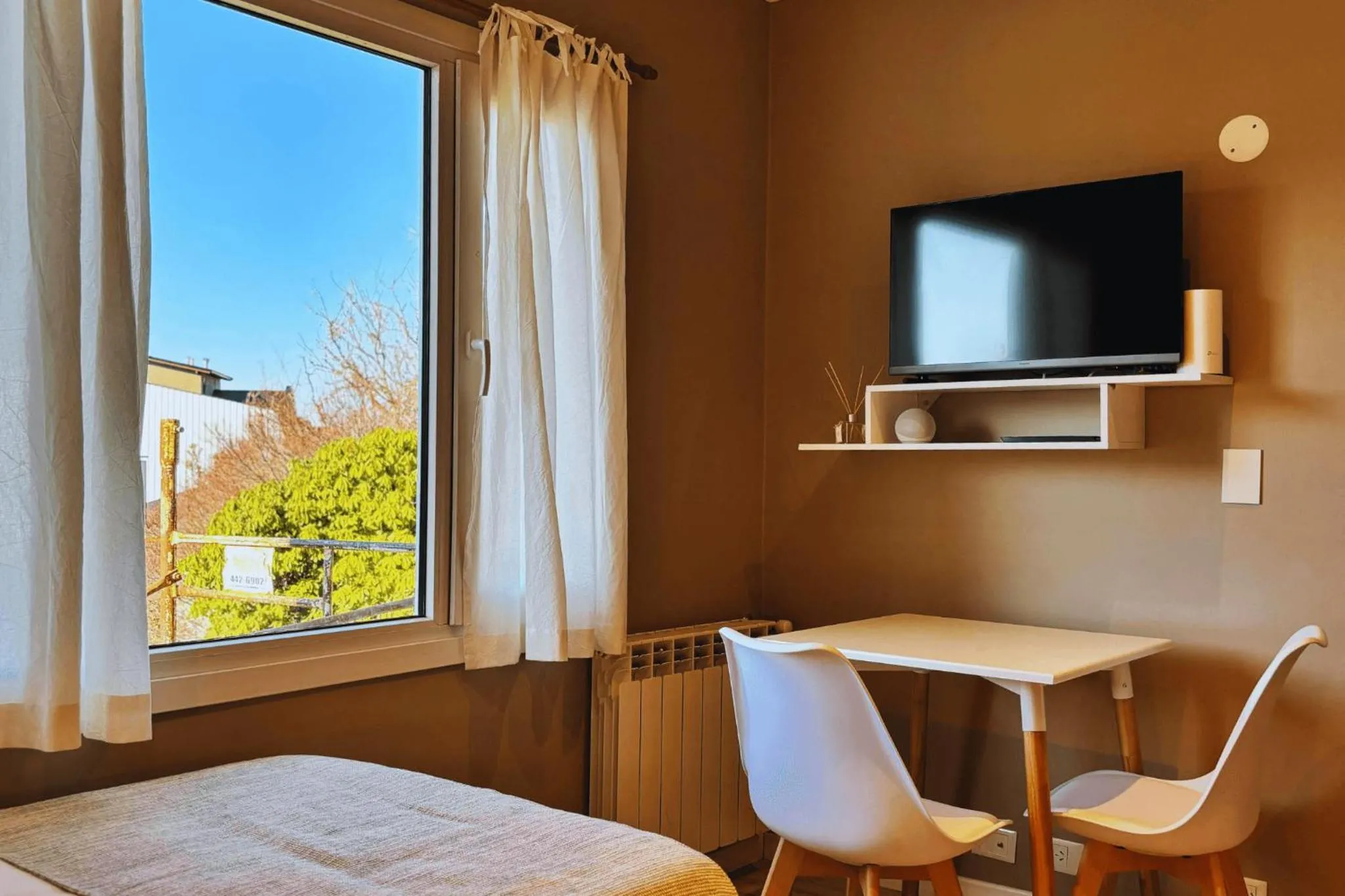 Seating area, Bed in Departamento completo en San Carlos de Bariloche, Argentina