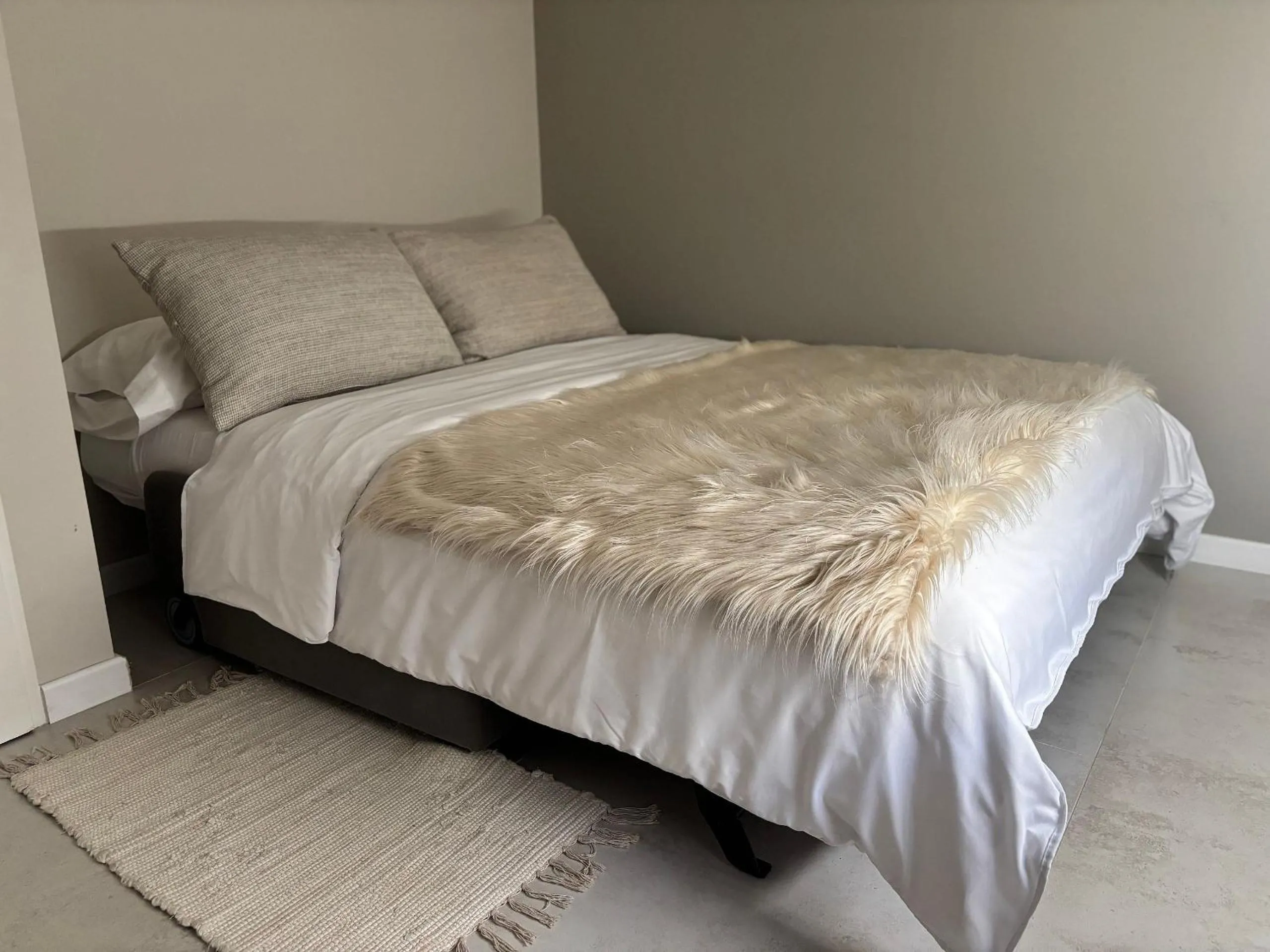 Bed in Departamento completo en San Carlos de Bariloche, Argentina