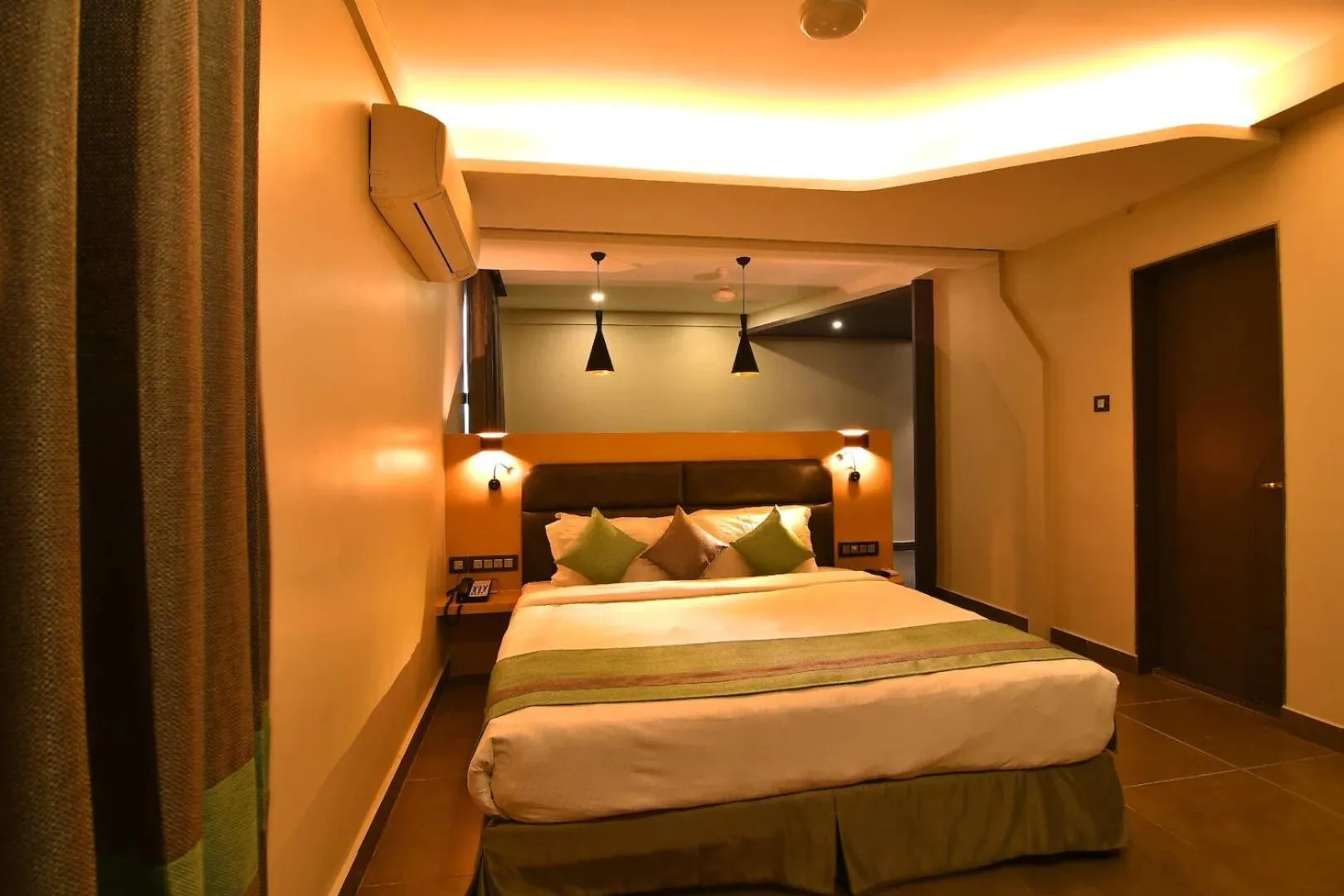 Bed in THE CENT HOTEL