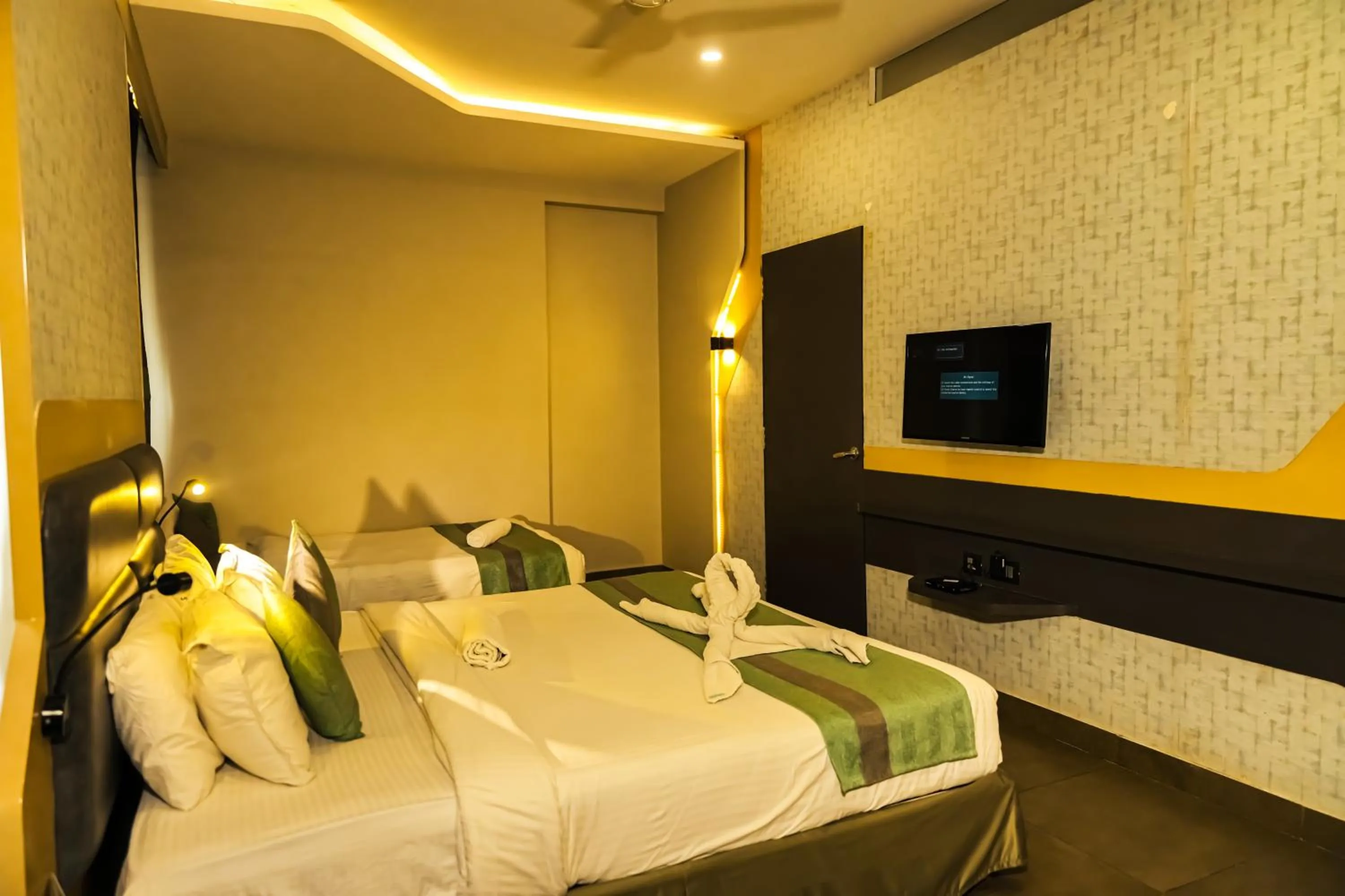 Bed in THE CENT HOTEL