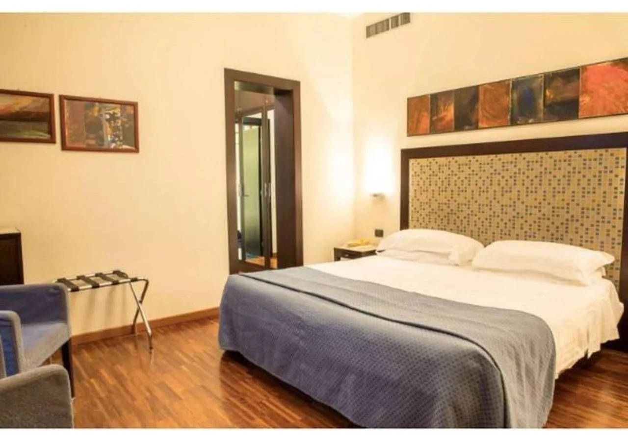 Photo of the whole room, Bed in Residenza Mecenate