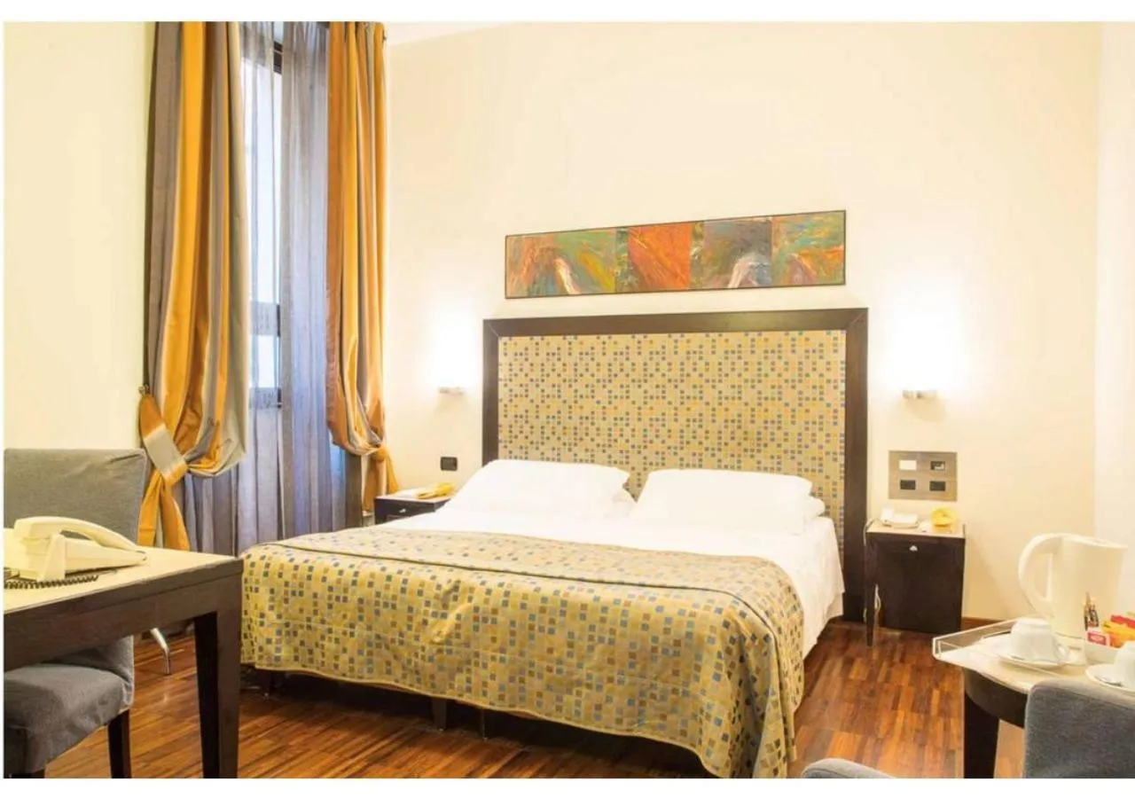 Photo of the whole room, Bed in Residenza Mecenate