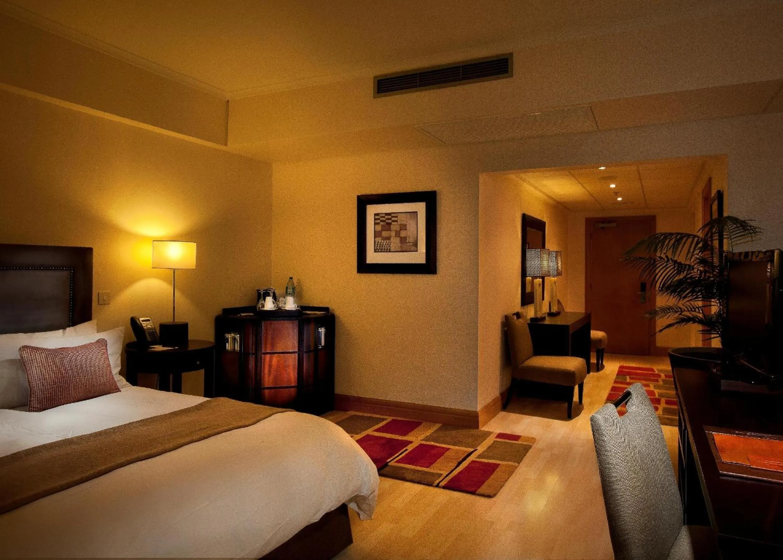 Bed in The Federal Palace Hotel and Casino