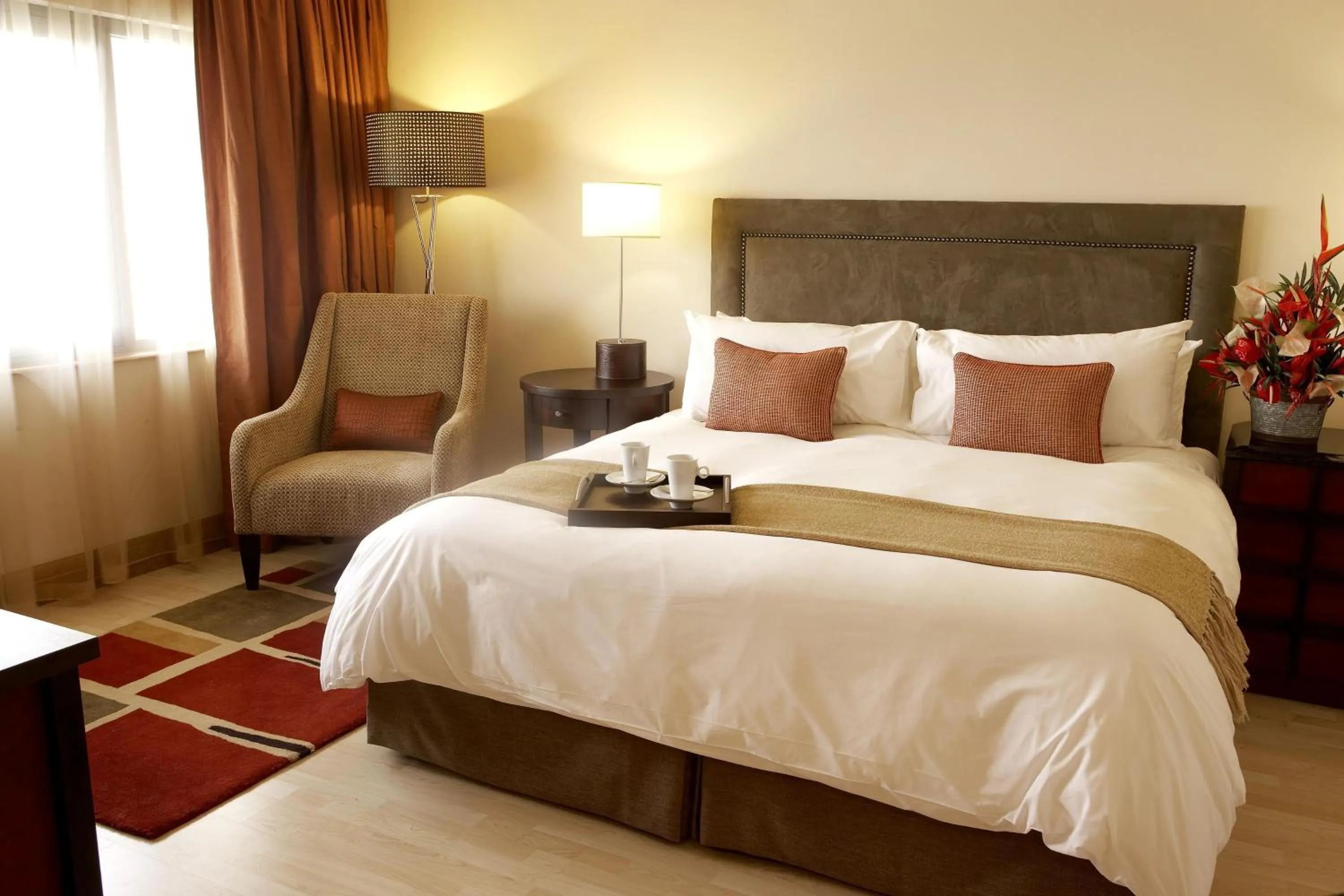 Bed in The Federal Palace Hotel and Casino