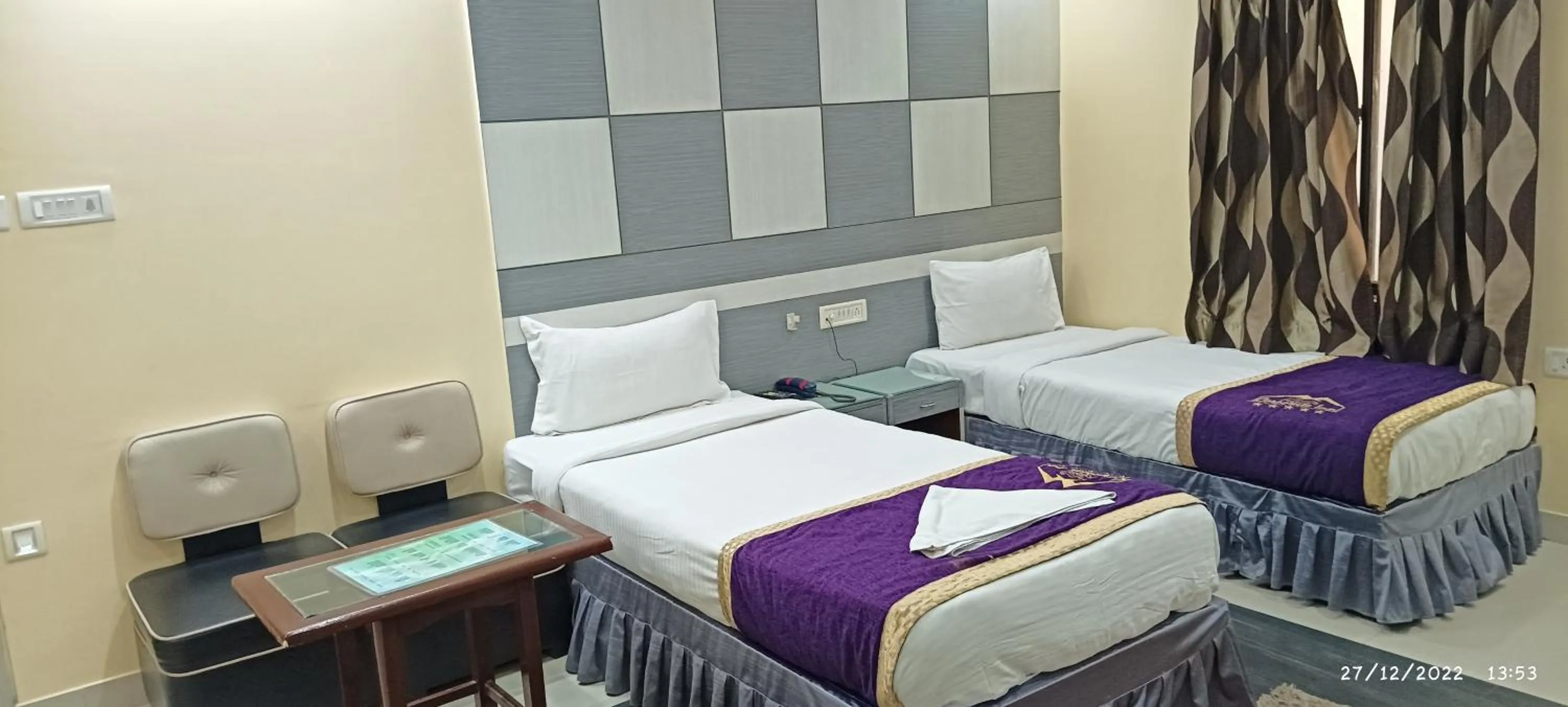 Bed in Hotel Grand Corporate