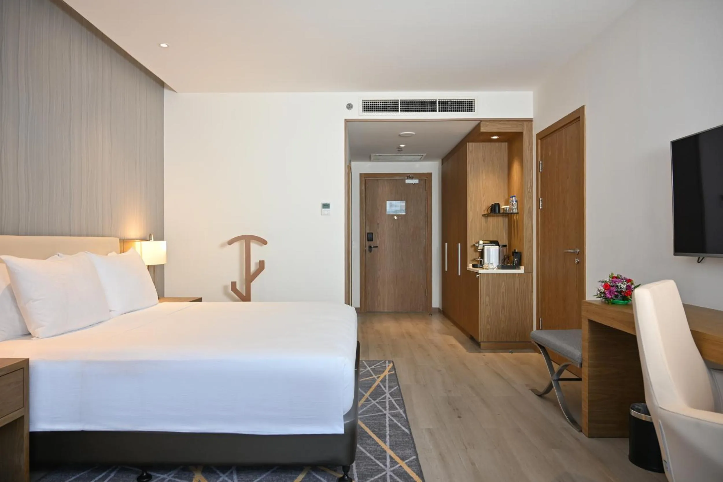 Bed in Clarion Hotel Jeddah Airport